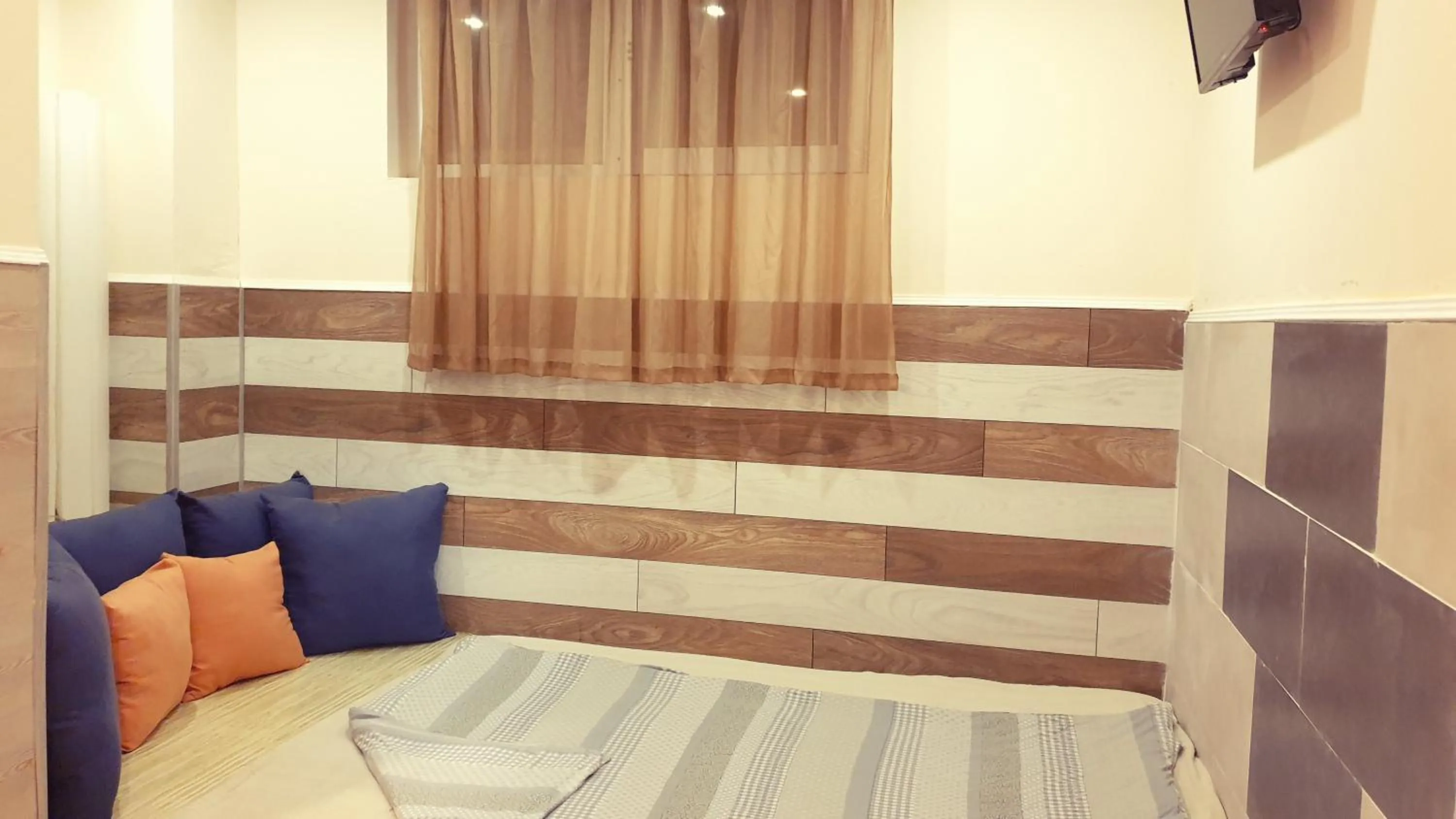 Bed in Paralax Hotel