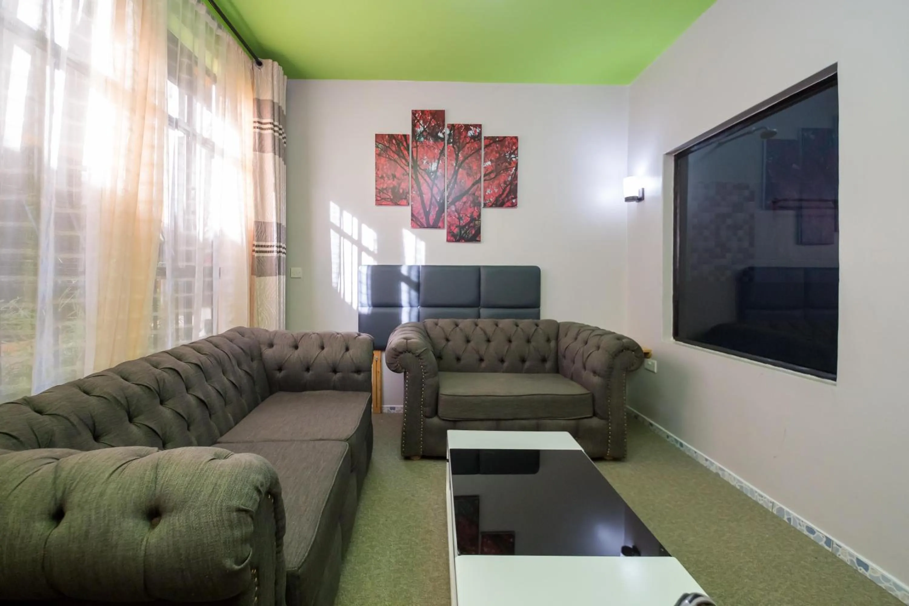 Seating area in Maple Inn Hotel