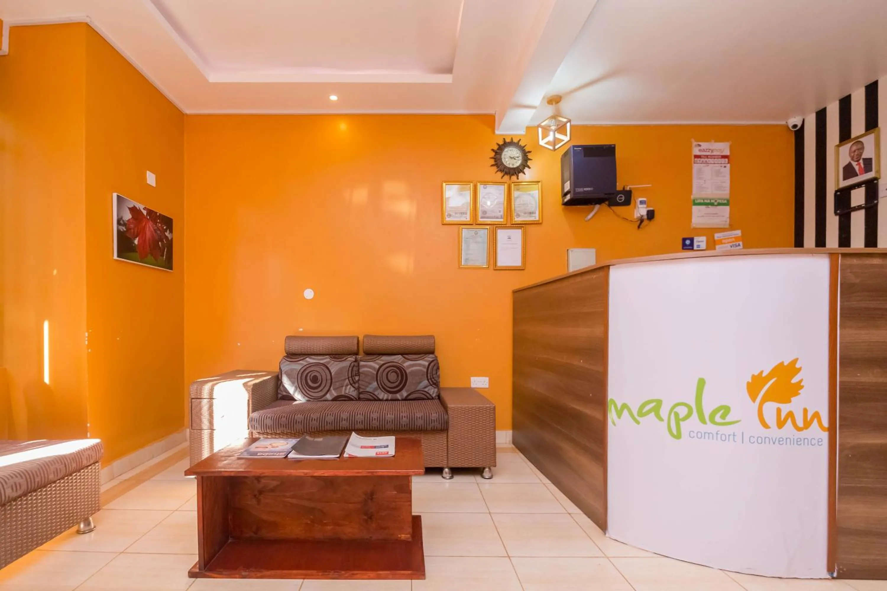 Lobby or reception in Maple Inn Hotel