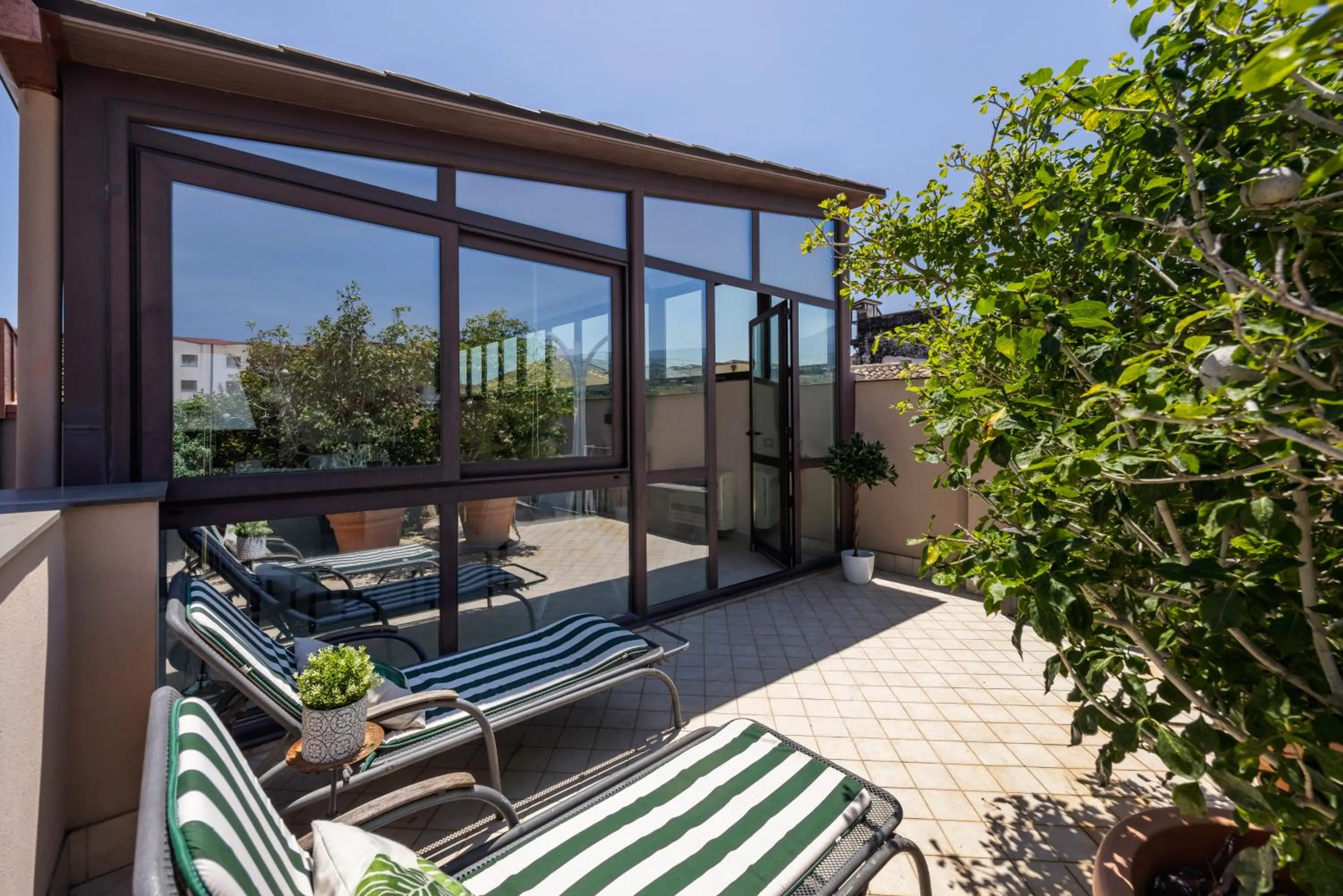 Property building in Luxury Panoramic Loft with heated pool near Catania, Taormina, the Sea and Mount Etna by SicilianRelaxingHomes