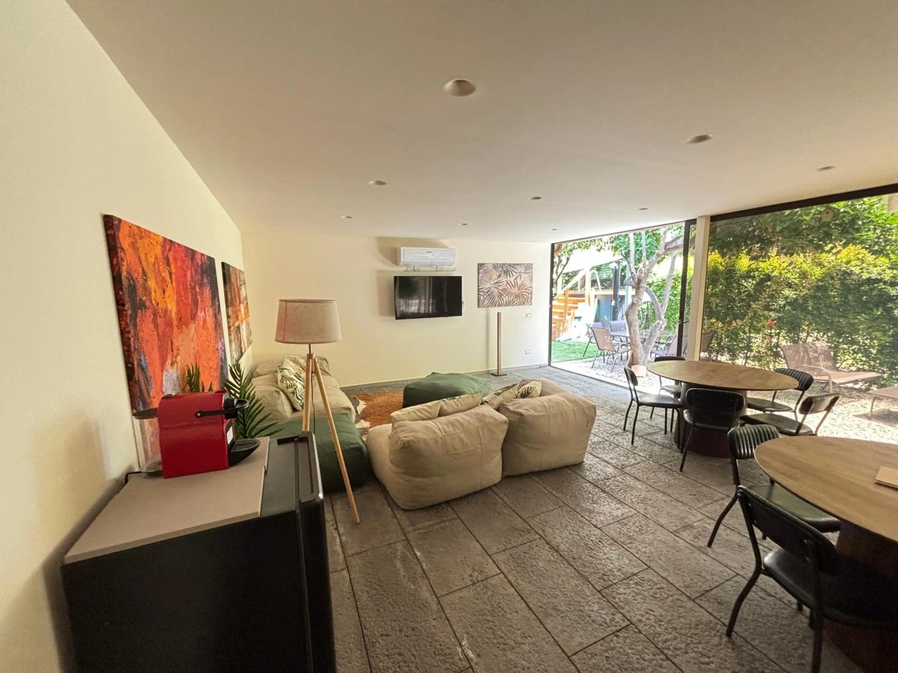 Communal lounge/ TV room in Luxury Panoramic Loft with heated pool near Catania, Taormina, the Sea and Mount Etna by SicilianRelaxingHomes
