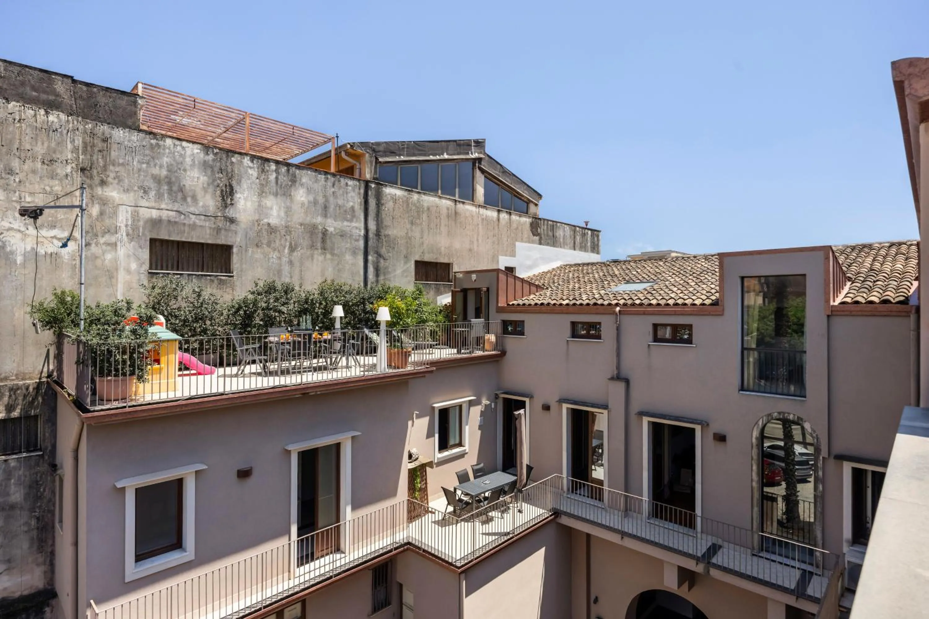 Property building in Luxury Panoramic Loft with heated pool near Catania, Taormina, the Sea and Mount Etna by SicilianRelaxingHomes
