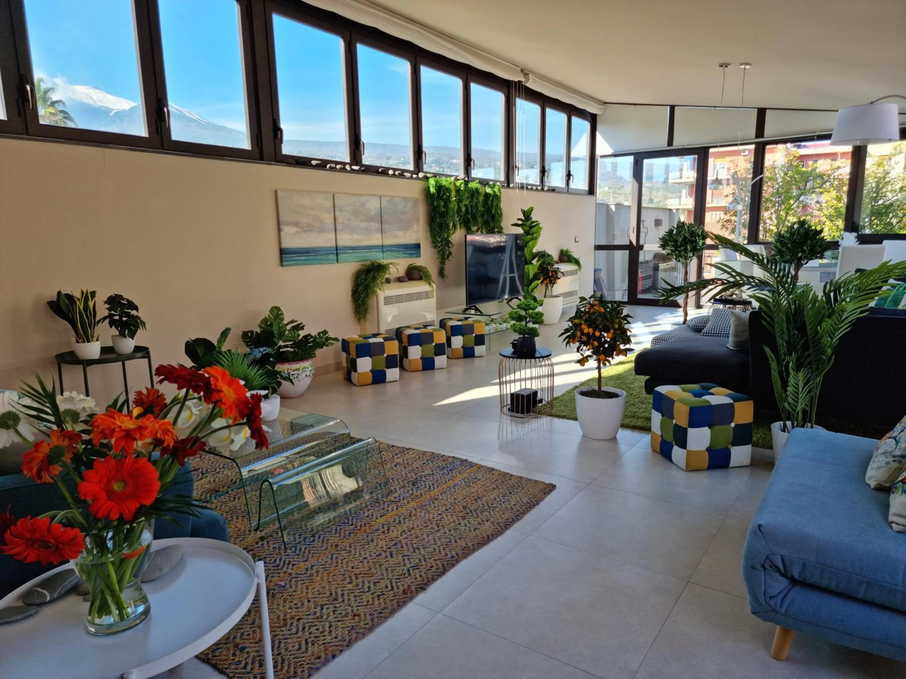 Living room in Luxury Panoramic Loft with heated pool near Catania, Taormina, the Sea and Mount Etna by SicilianRelaxingHomes
