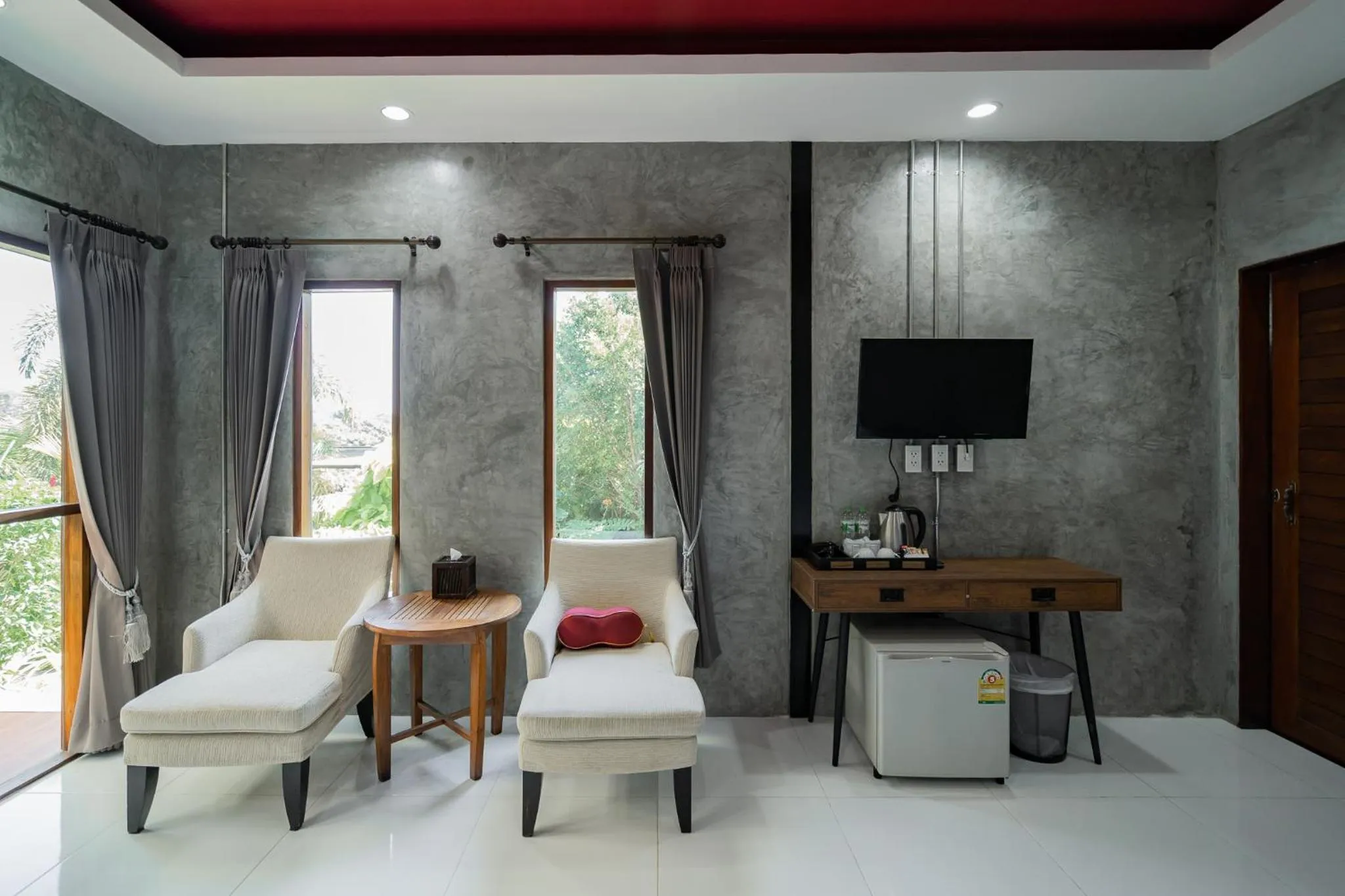 Seating area in The Loft Panwa Resort