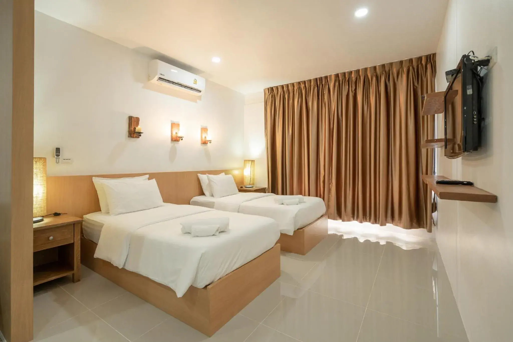 Basic Triple Room in The Loft Panwa Resort Basic Triple Room in The Loft Panwa Resort