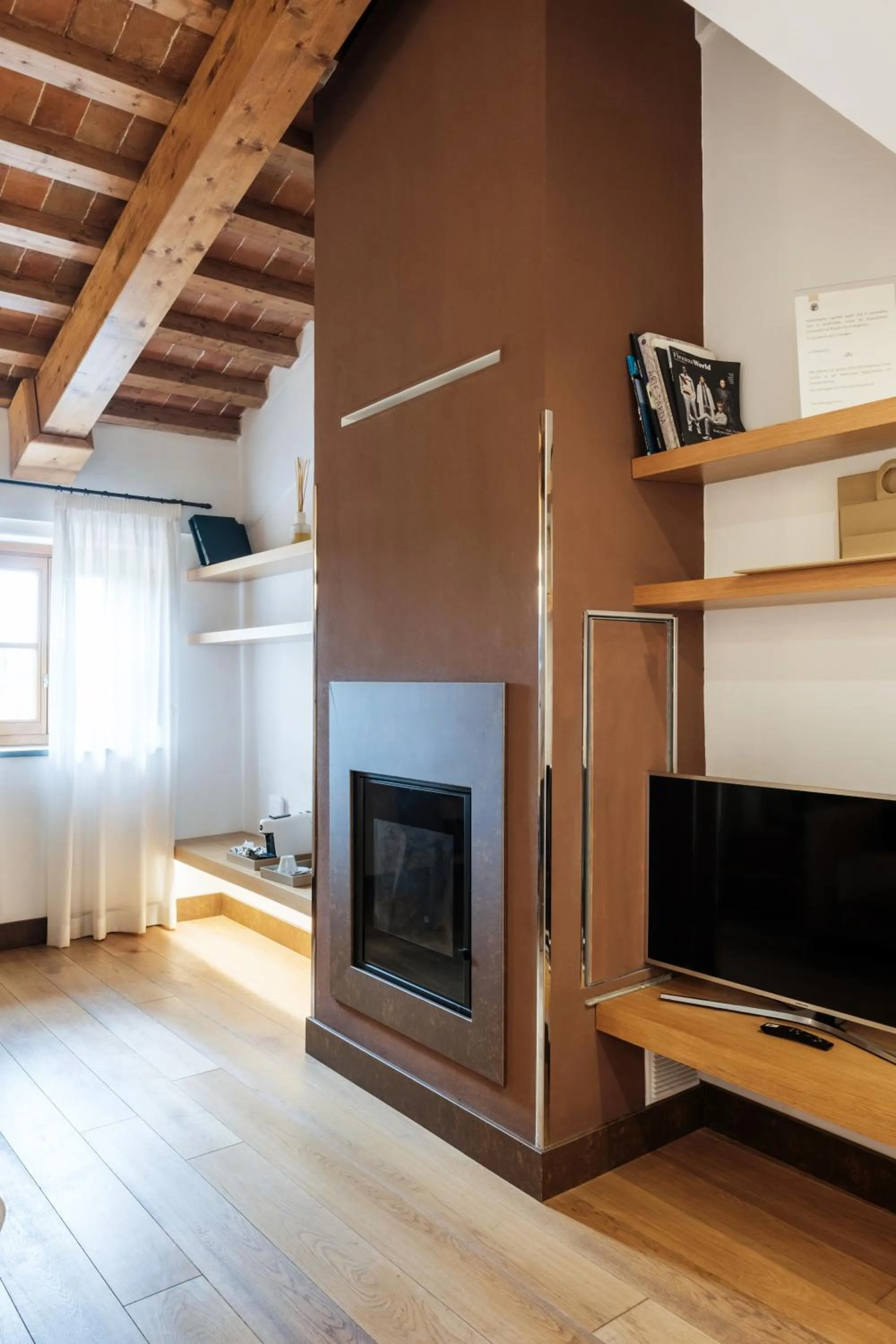 Communal lounge/ TV room in Villa Tolomei Hotel & Resort