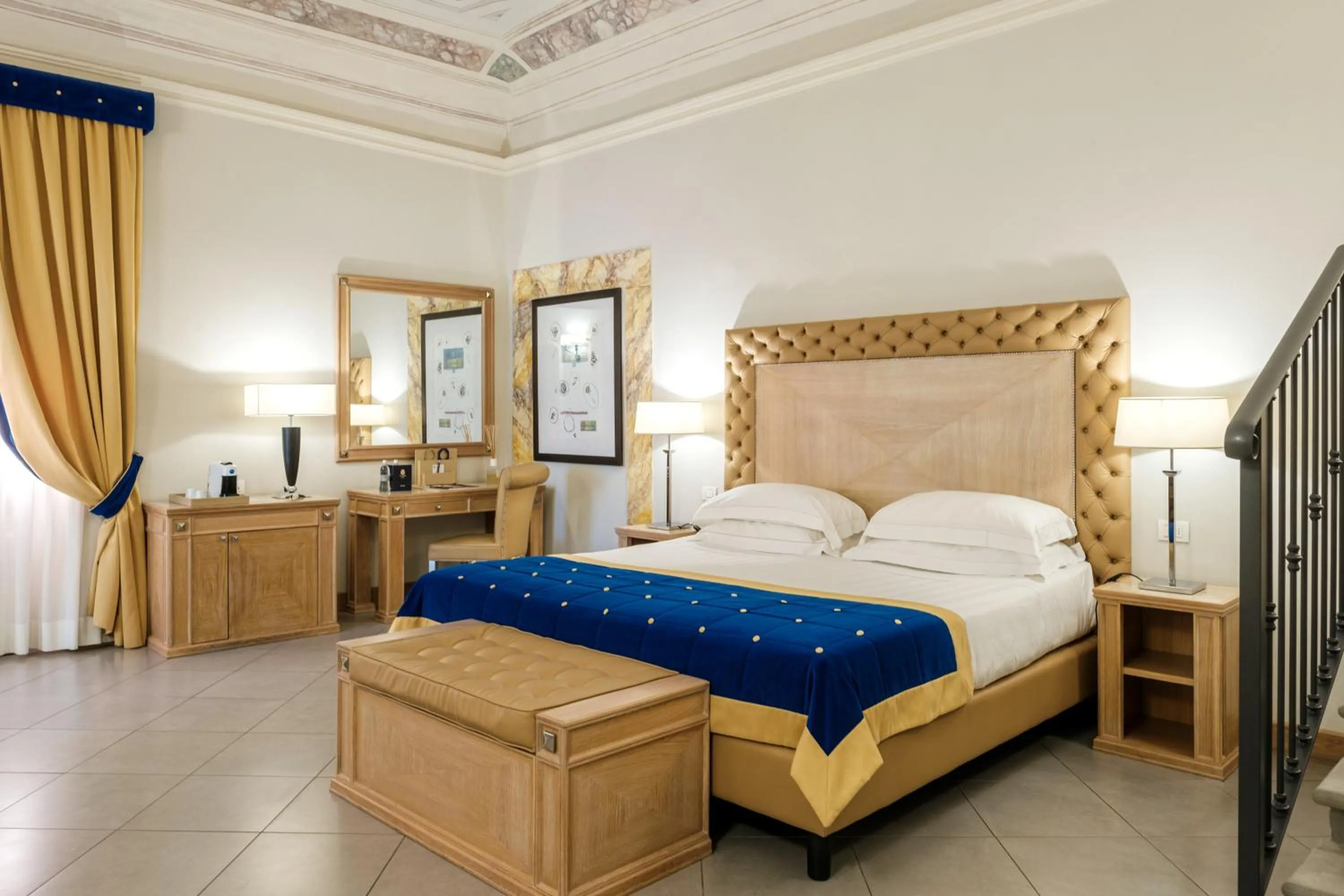 Bed in Villa Tolomei Hotel & Resort