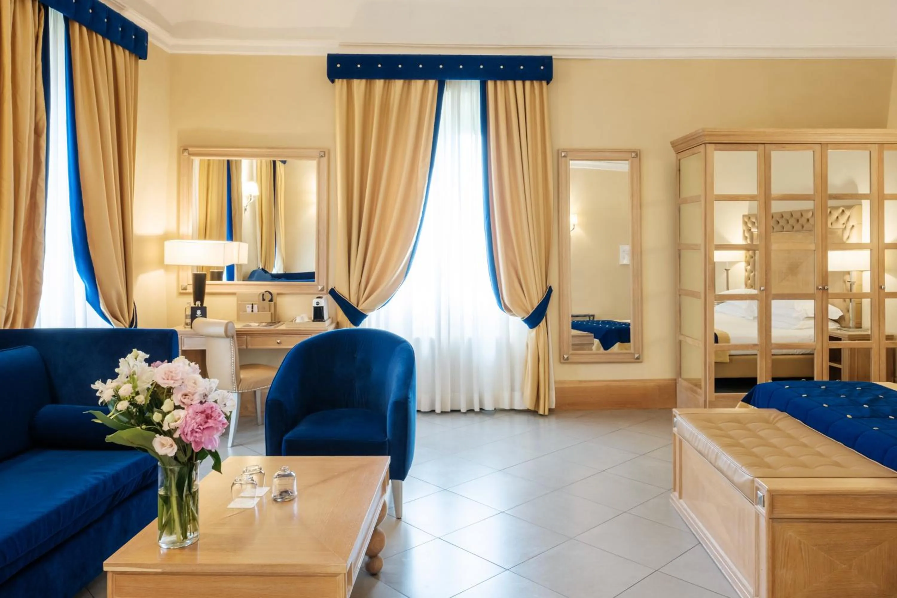 Bed in Villa Tolomei Hotel & Resort