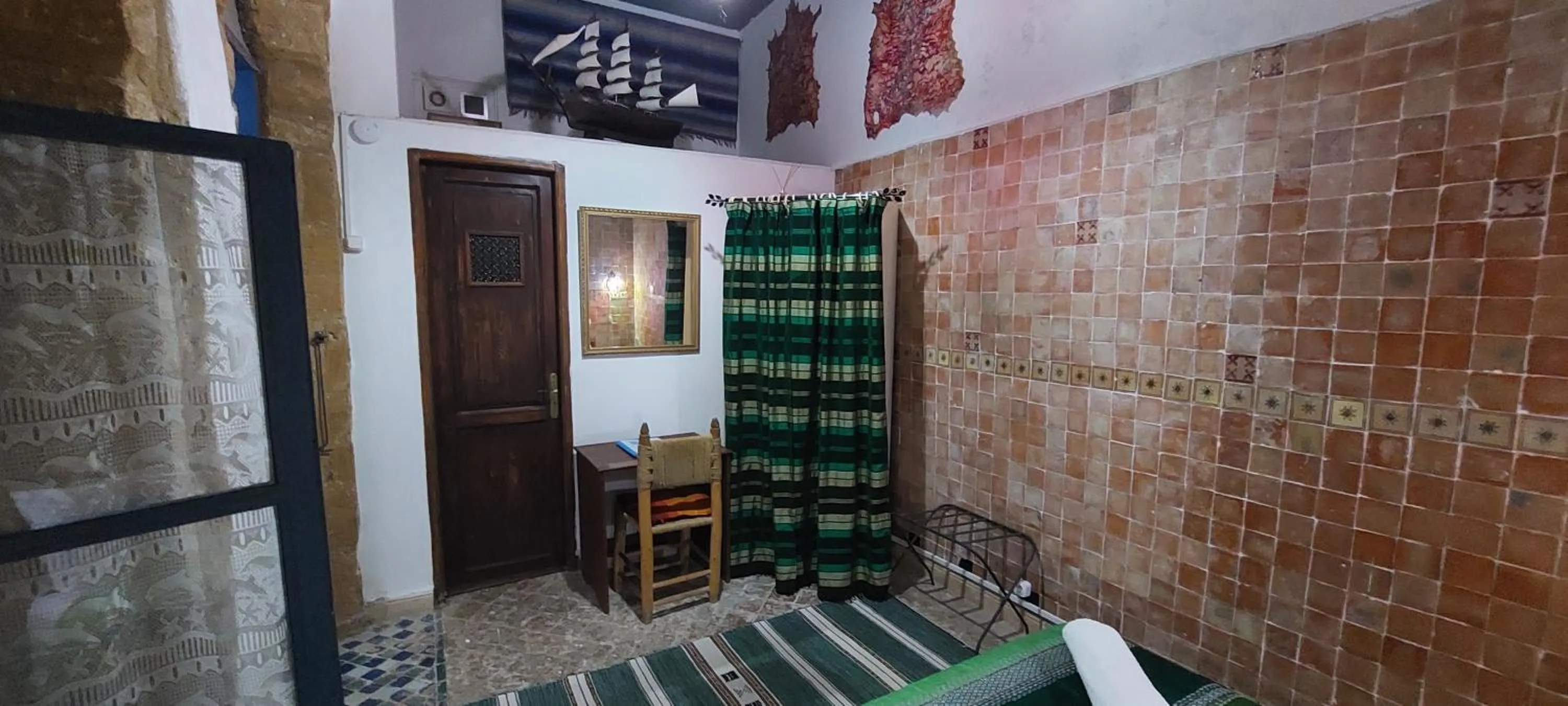 Bedroom in Riad Le Cheval Blanc