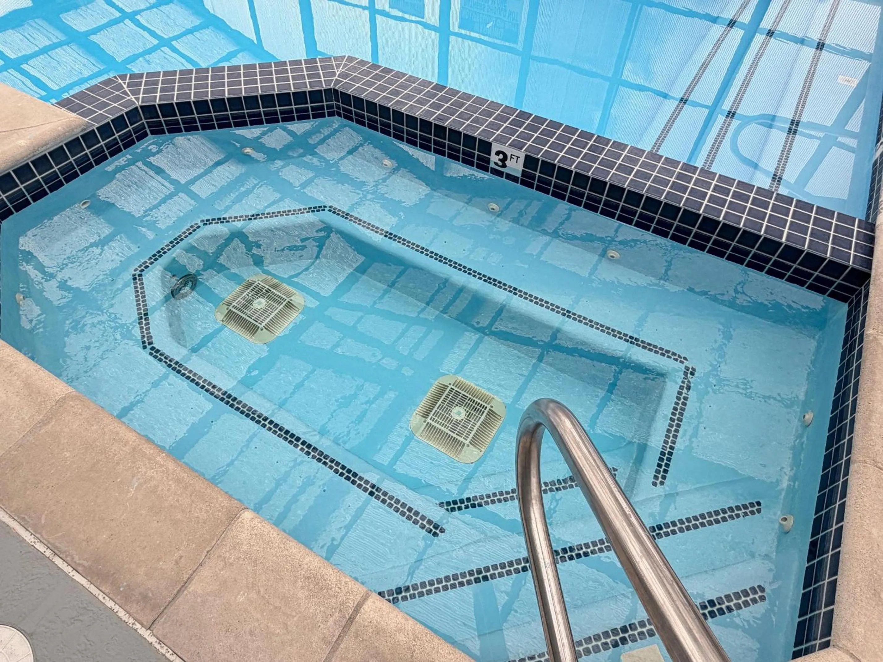 Swimming pool in Super 8 by Wyndham Logan