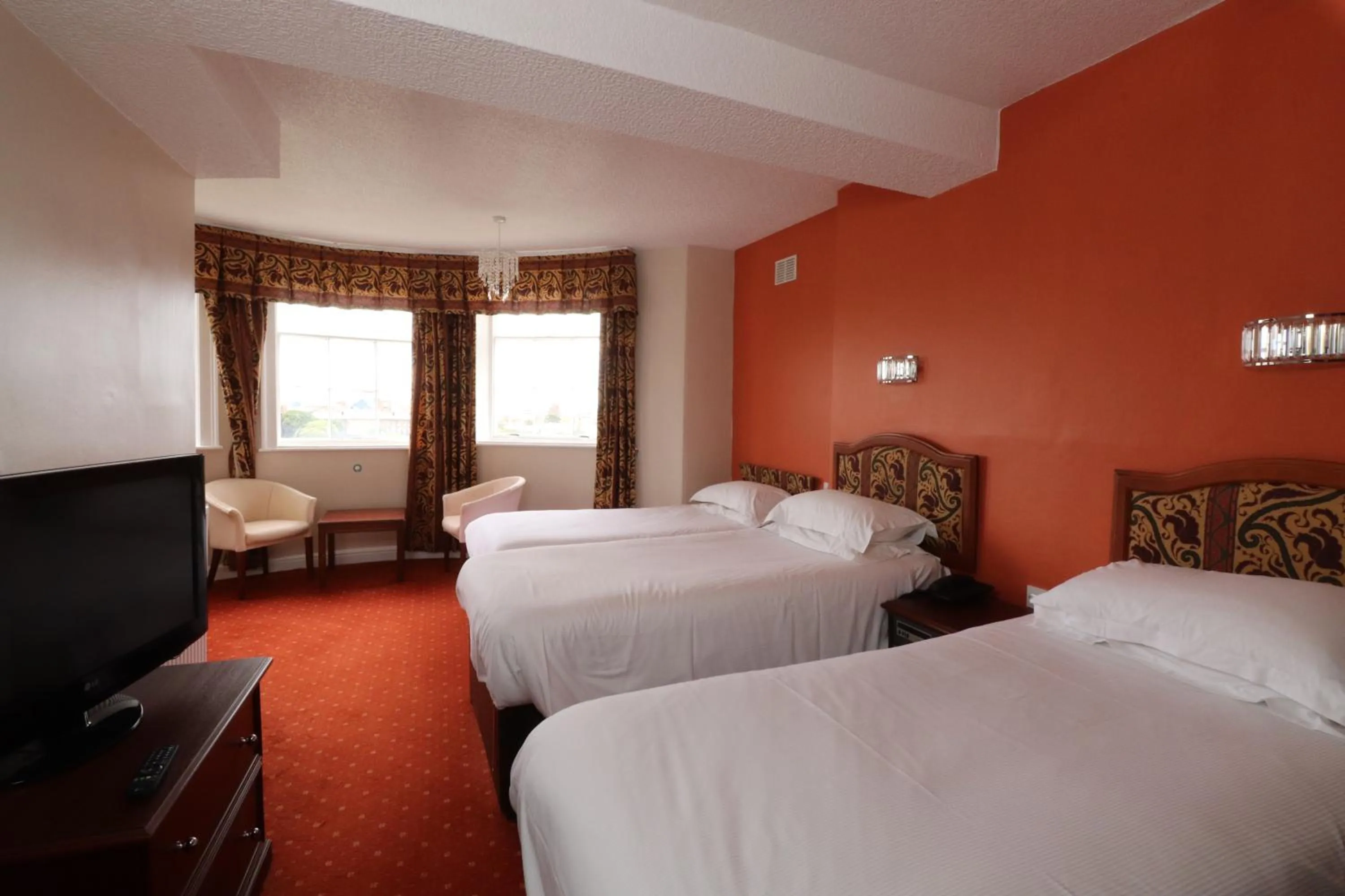 Photo of the whole room in The Esplanade Hotel