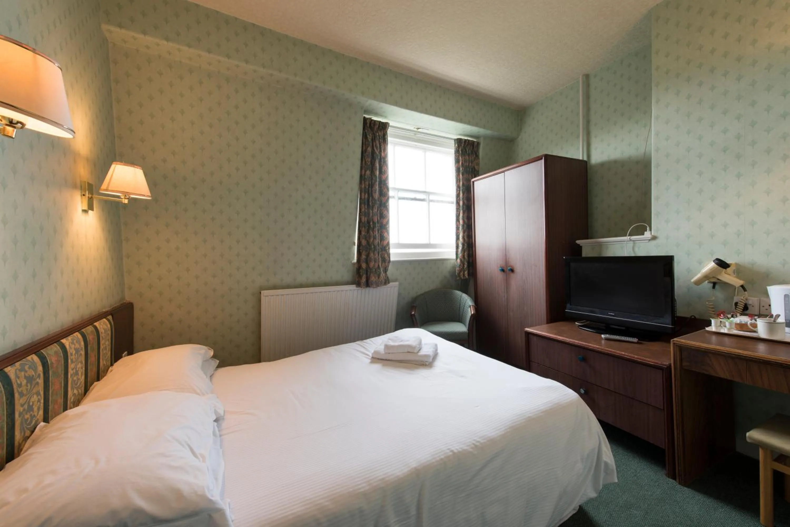 Bedroom in The Esplanade Hotel