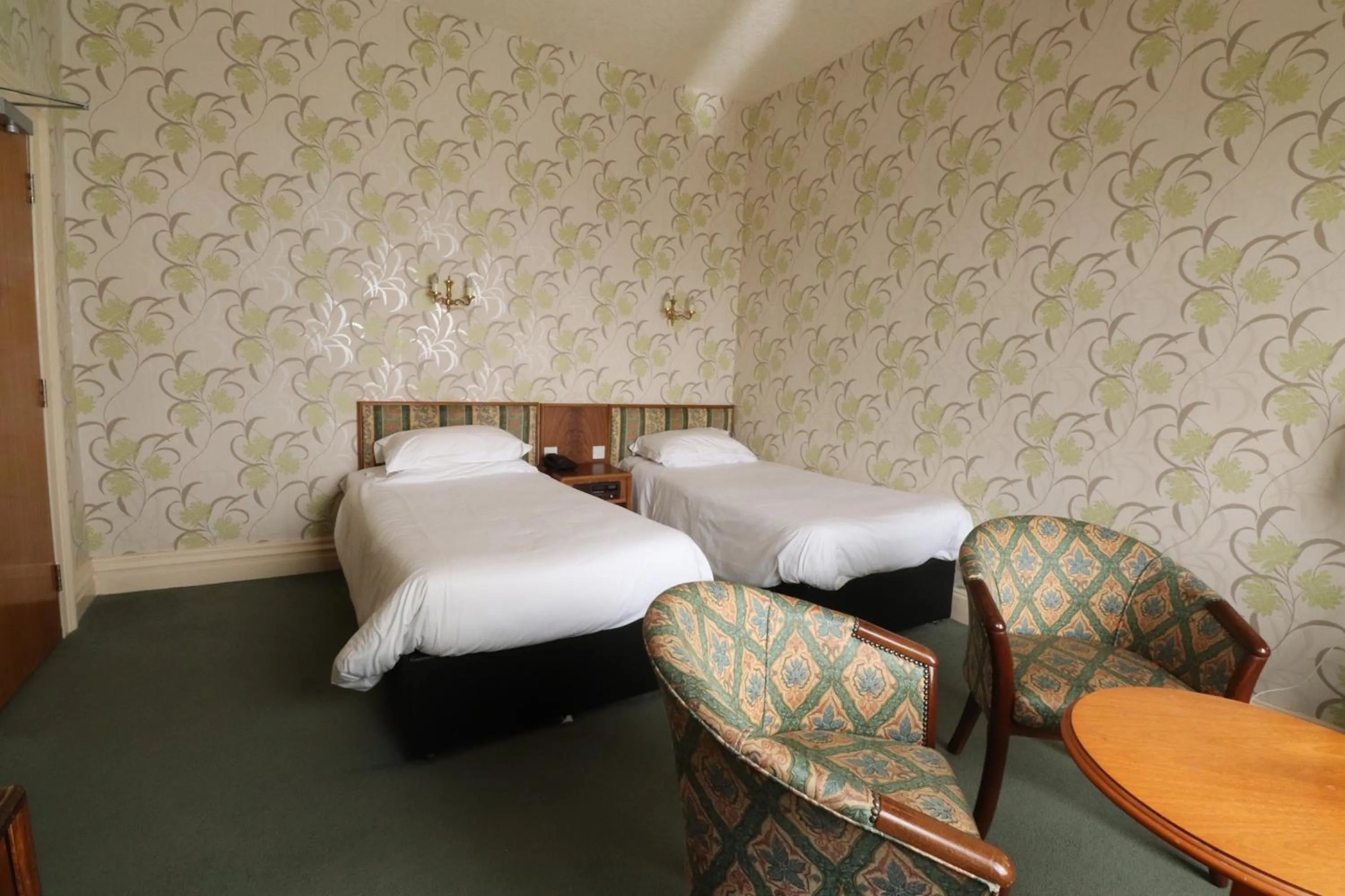 Photo of the whole room in The Esplanade Hotel