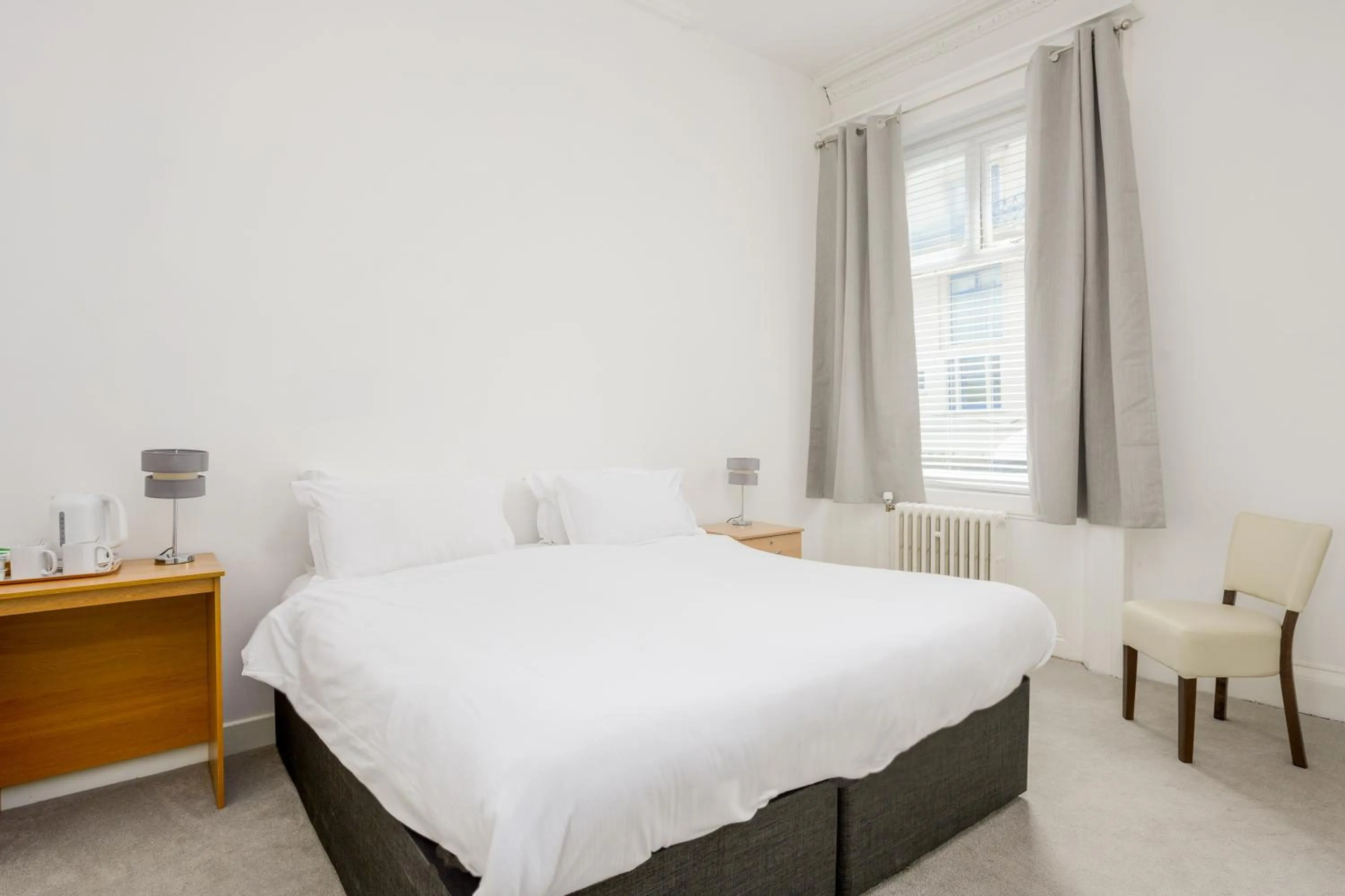 Bedroom in The Esplanade Hotel