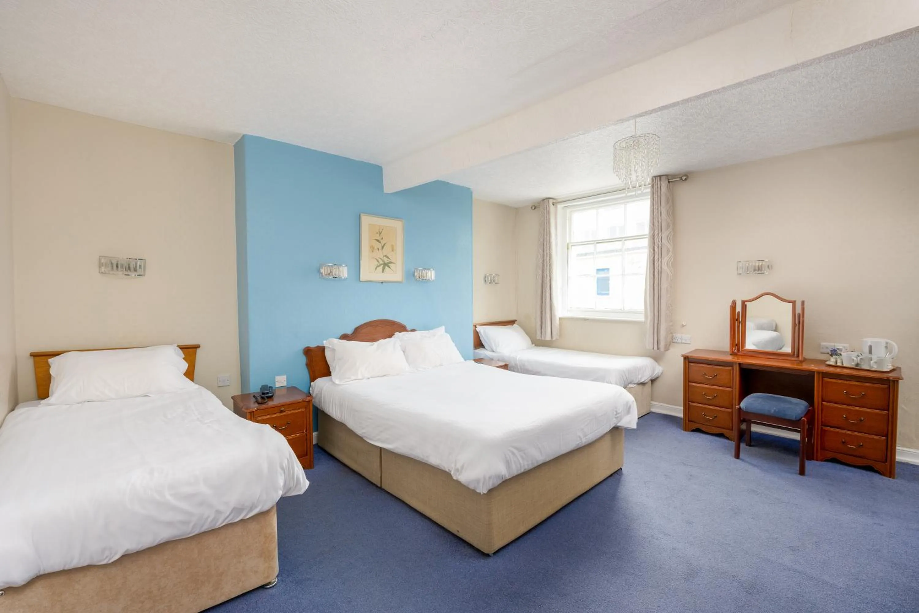 Bedroom in The Esplanade Hotel