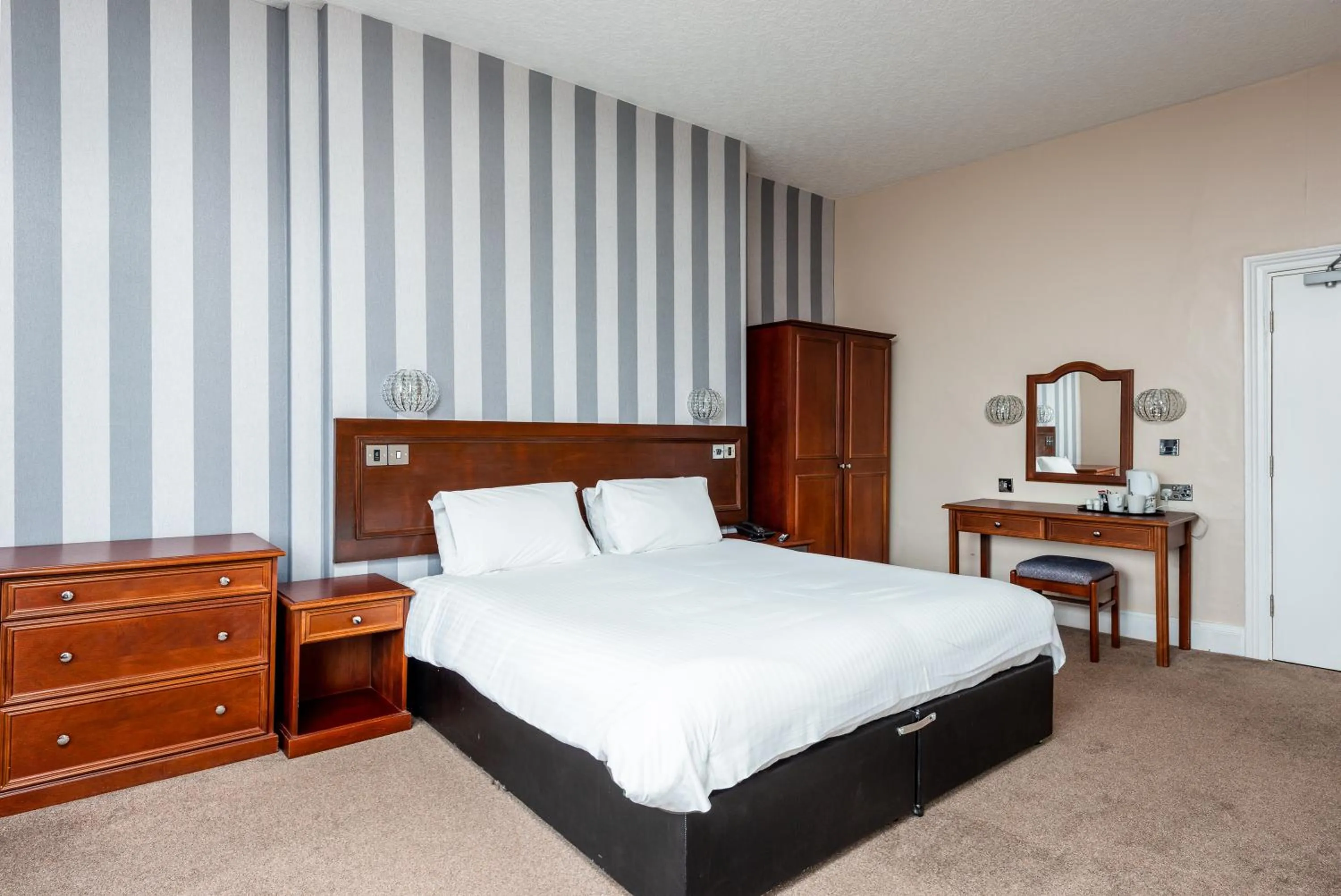 Bed in The Esplanade Hotel