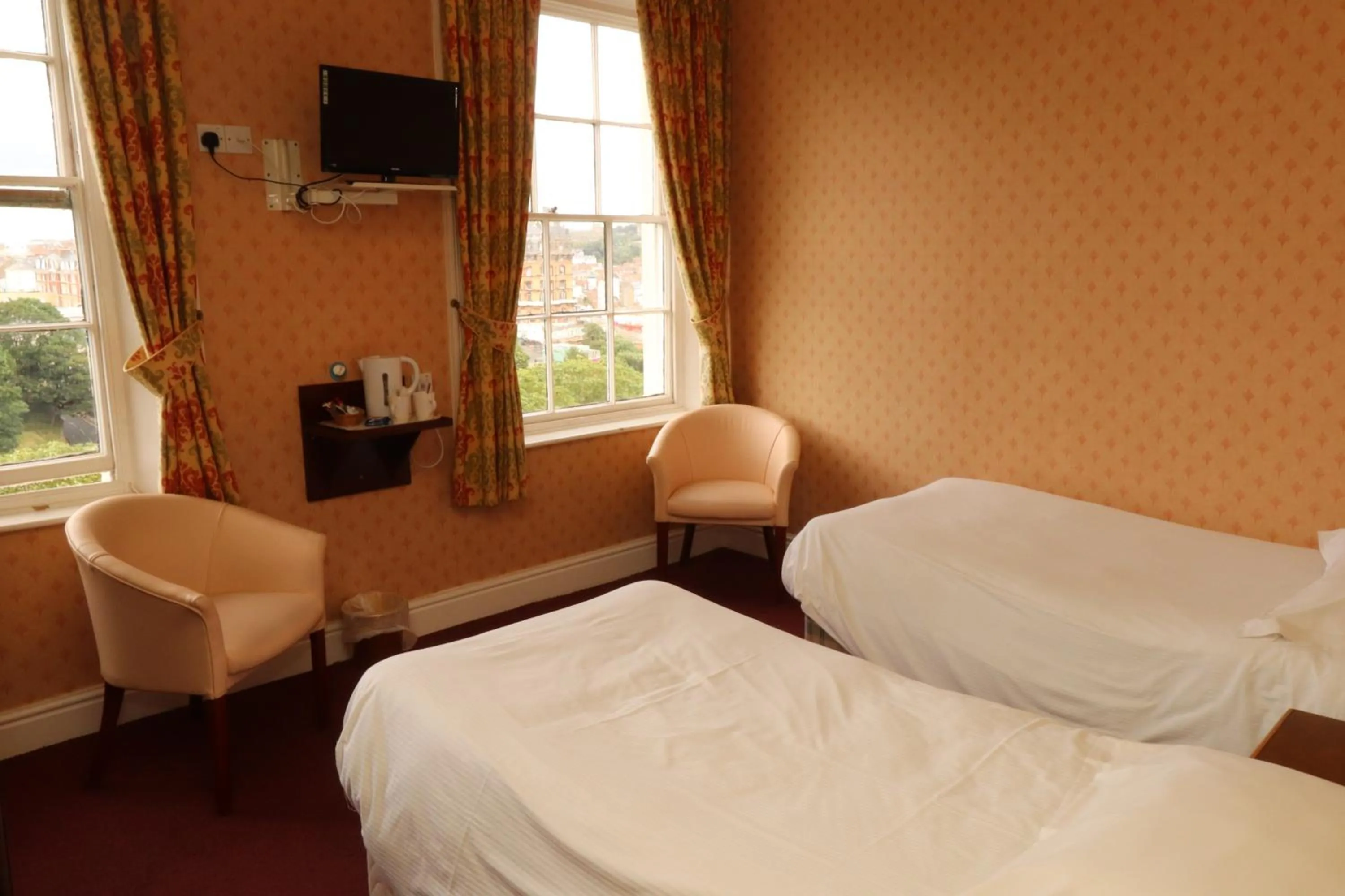 Photo of the whole room in The Esplanade Hotel