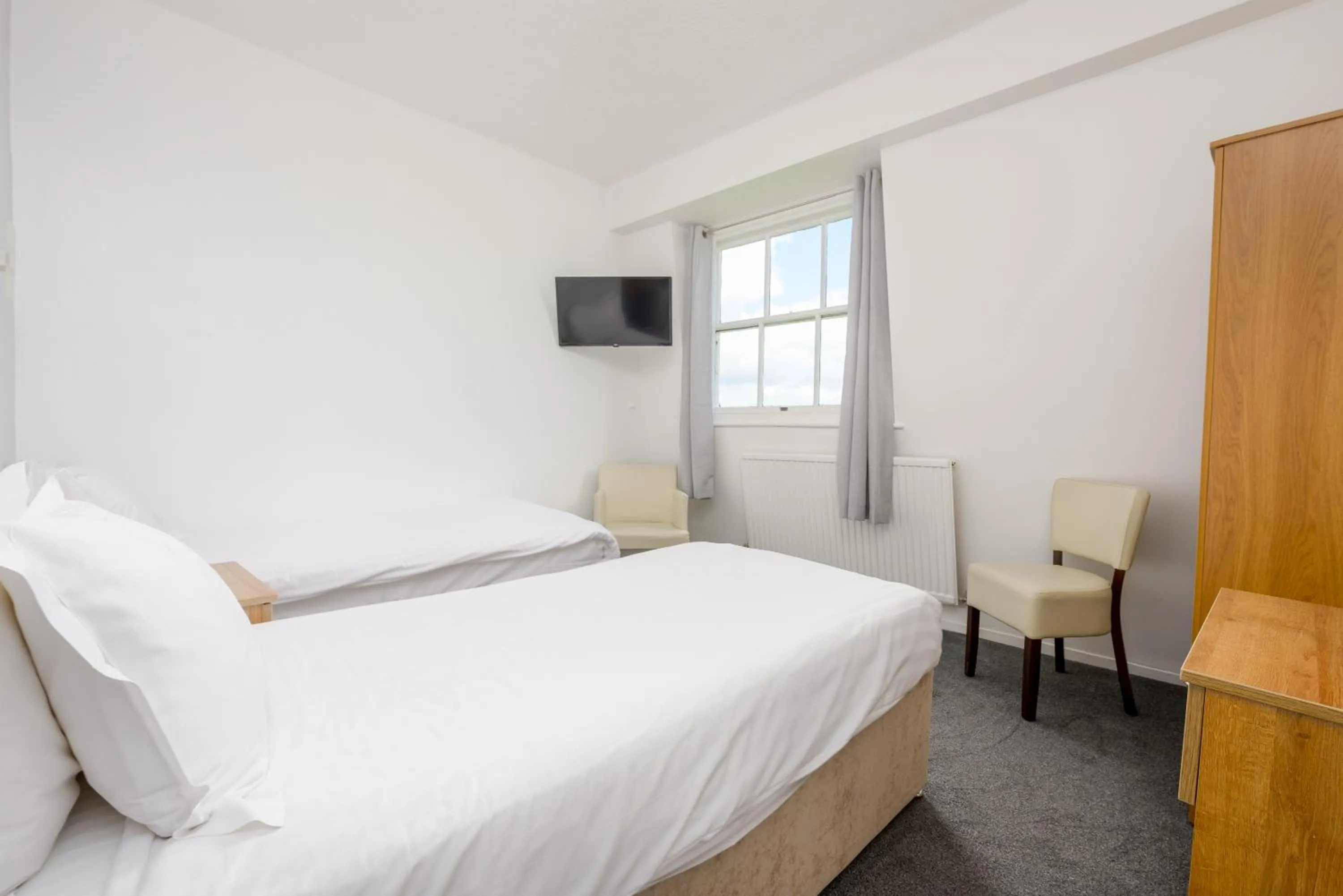 Bedroom in The Esplanade Hotel