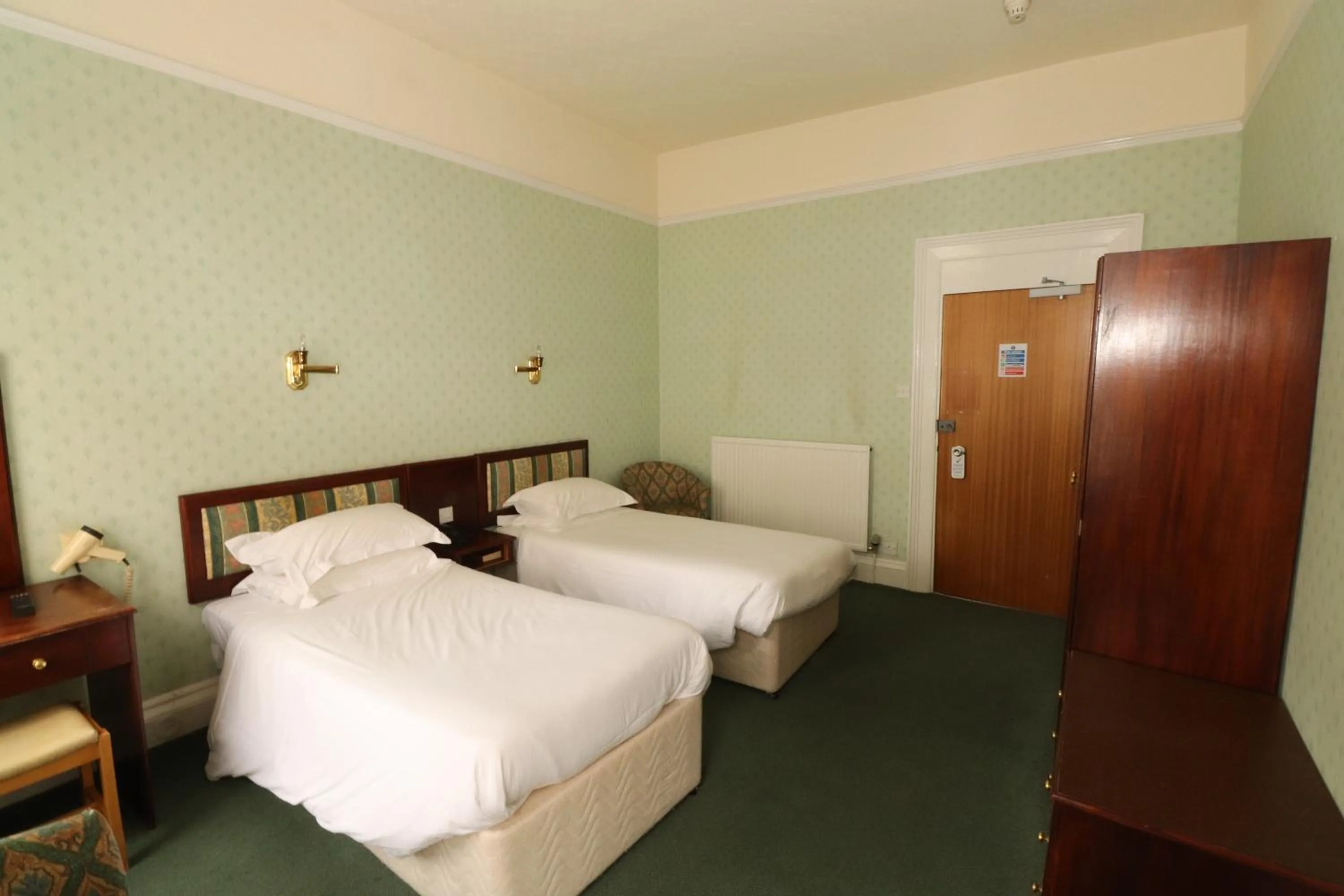 Photo of the whole room in The Esplanade Hotel