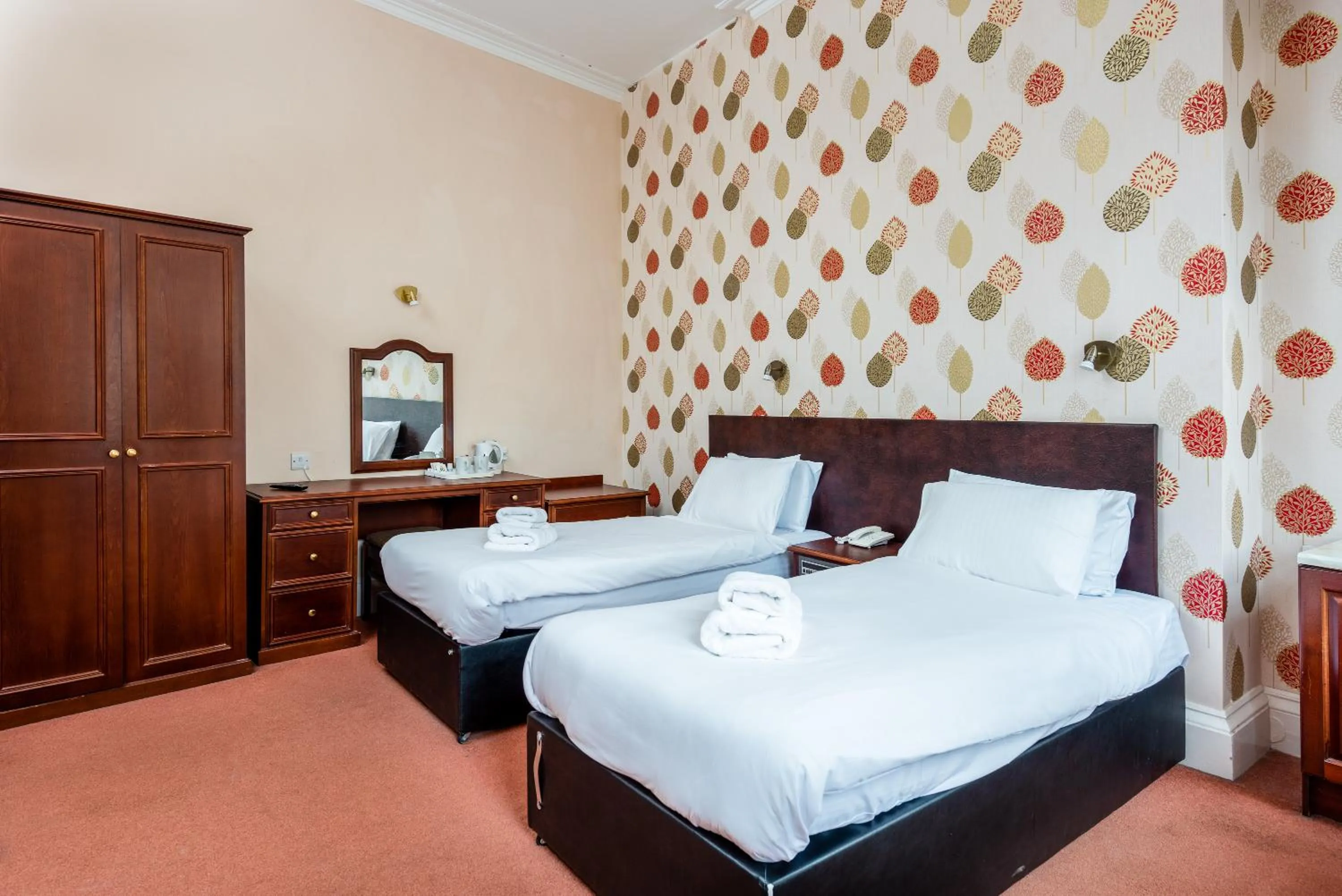 Bed in The Esplanade Hotel