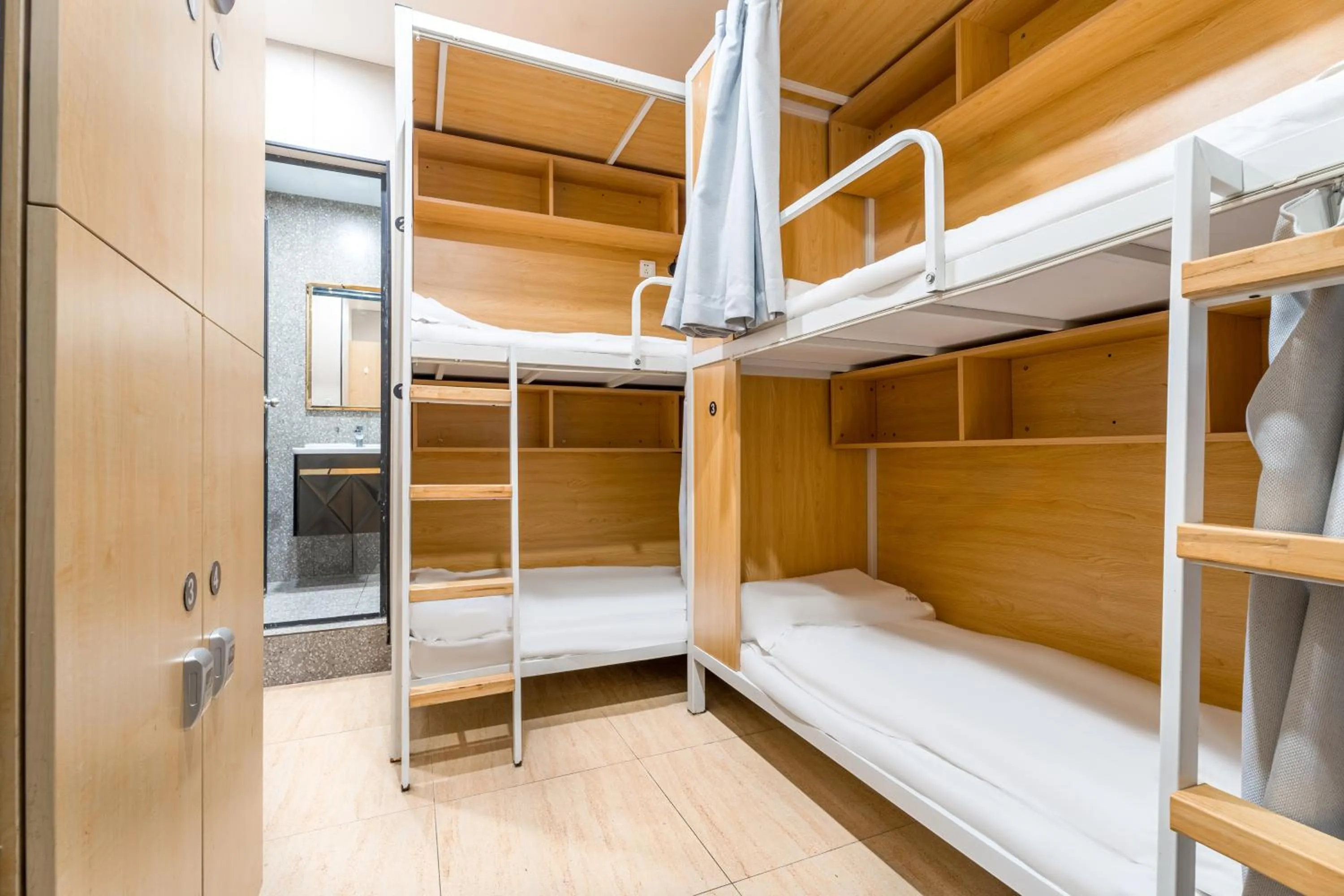 Bed in Meego Yes Hotel