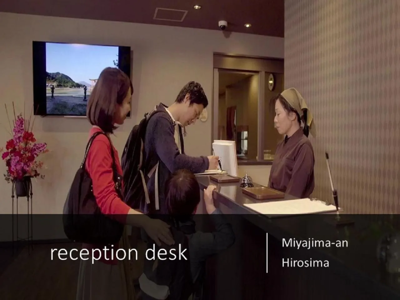 Staff in Ryokan with natural hot springs and okonomiyaki Miyajima-an Hiroshima
