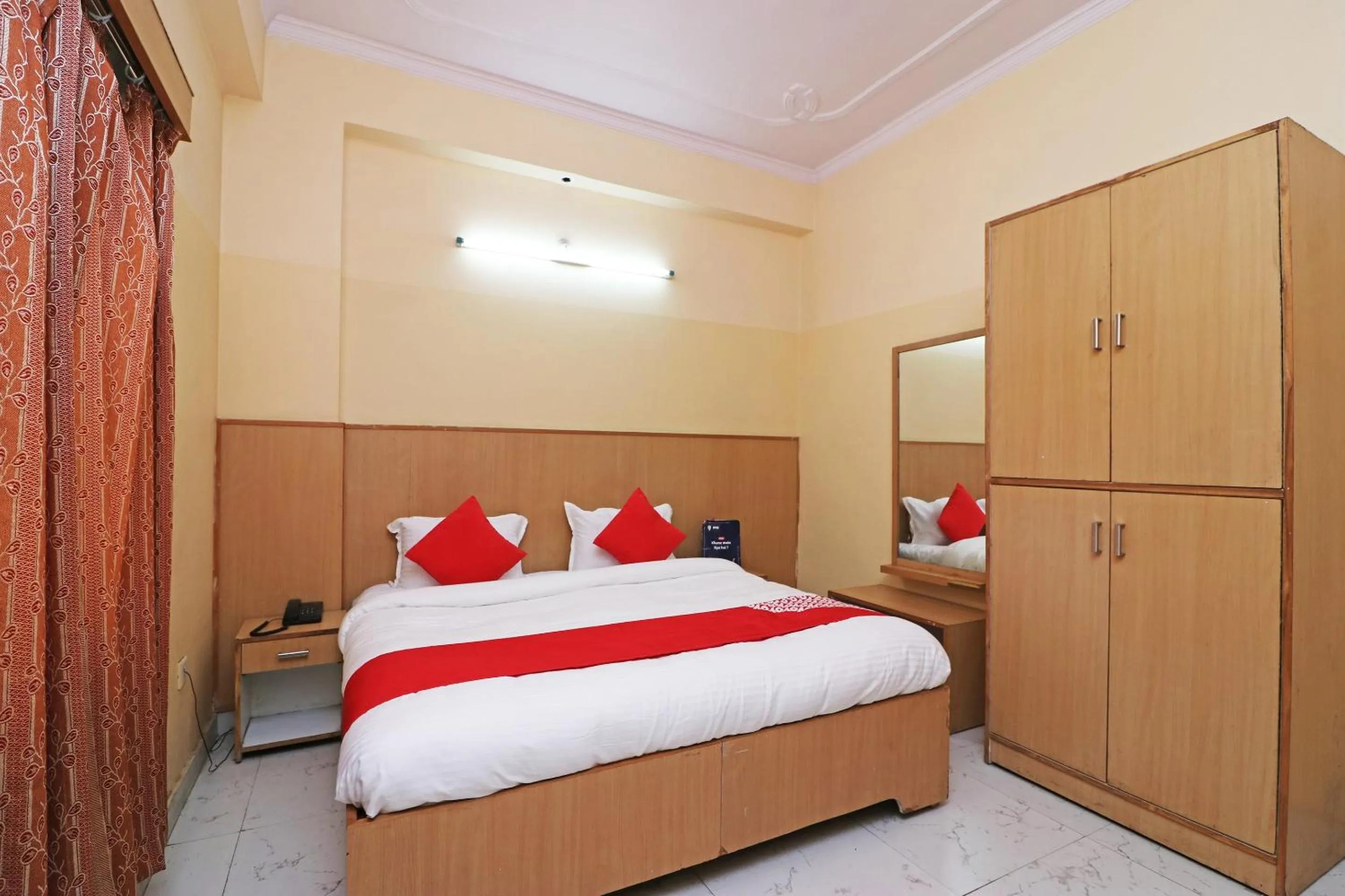 Bedroom in Super Hotel O AKBAR PALACE