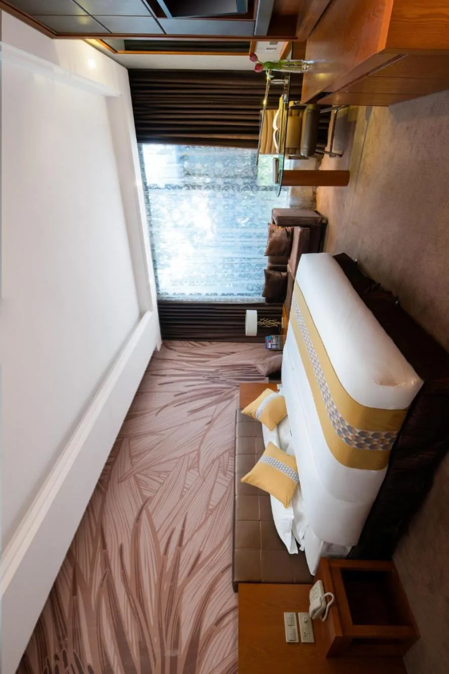 Bed in Yun'an Huidu Hotel