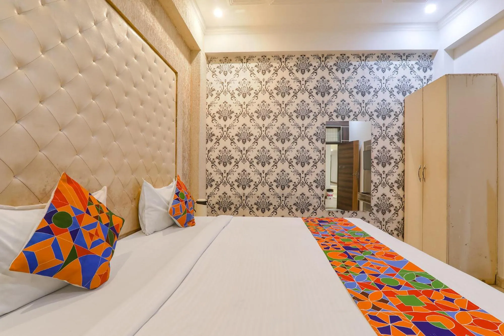 Bed in FabHotel Triveni