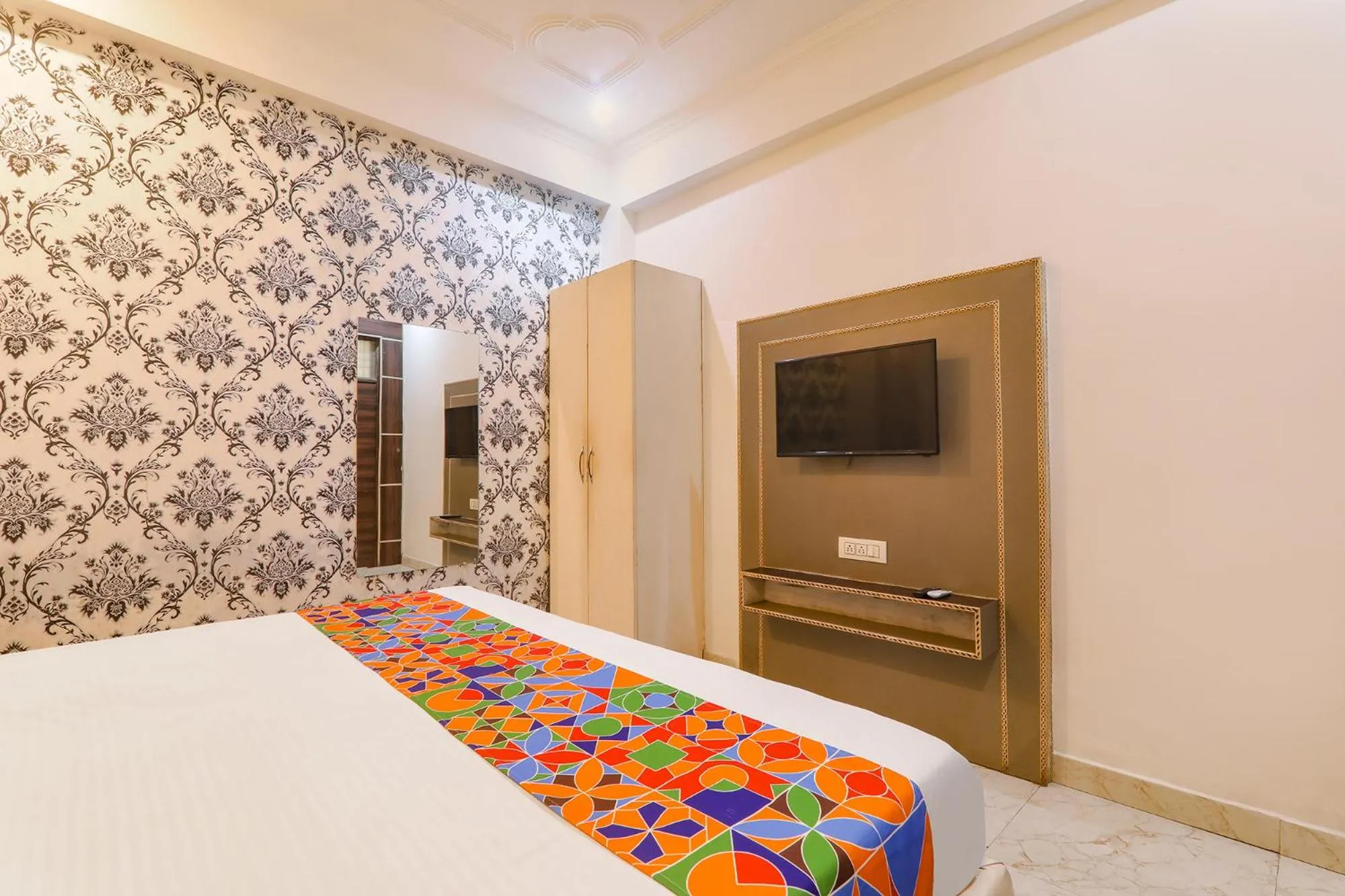 Bed in FabHotel Triveni