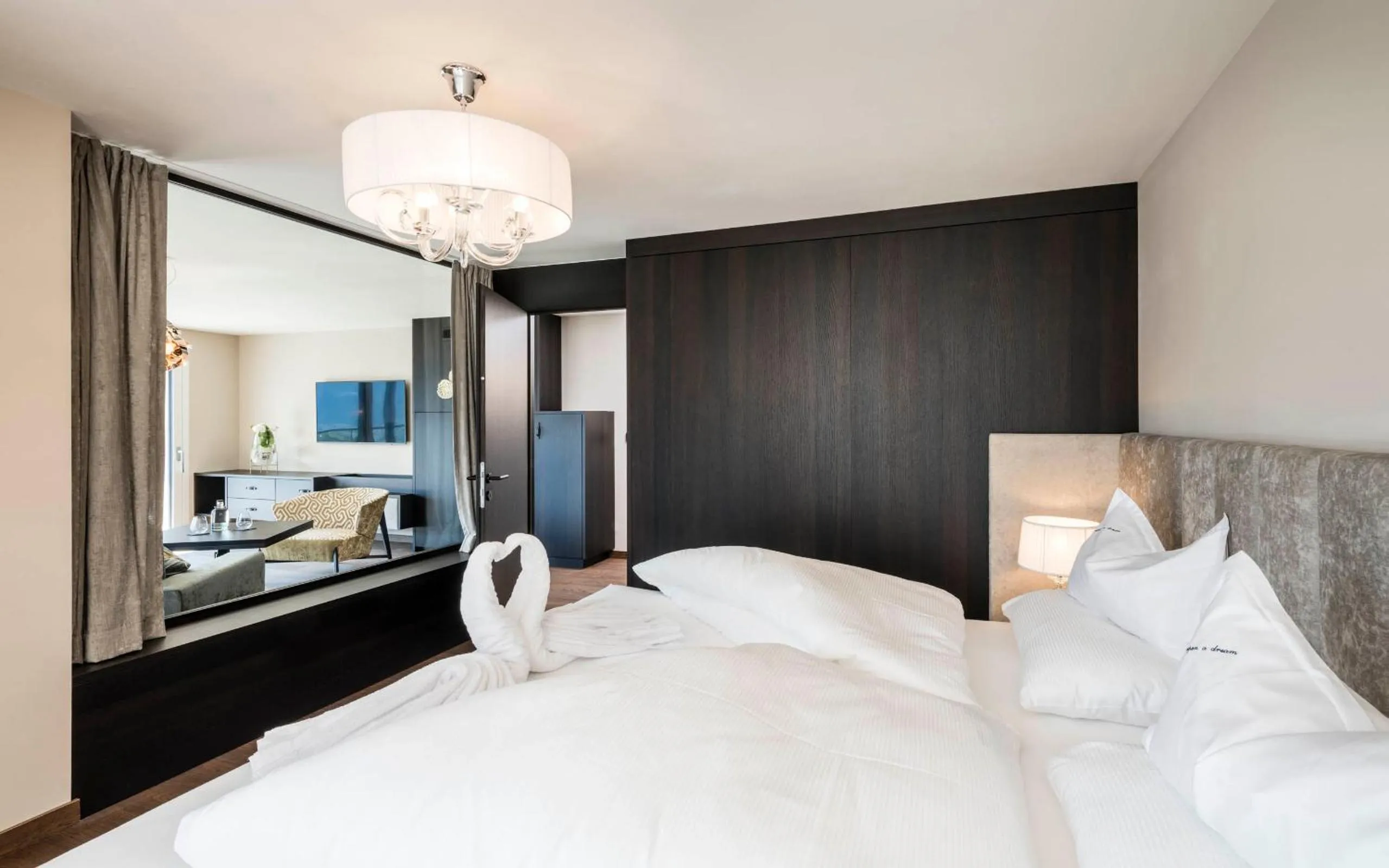 Living room, Bed in Prunner Luxury Suites - Adults Only