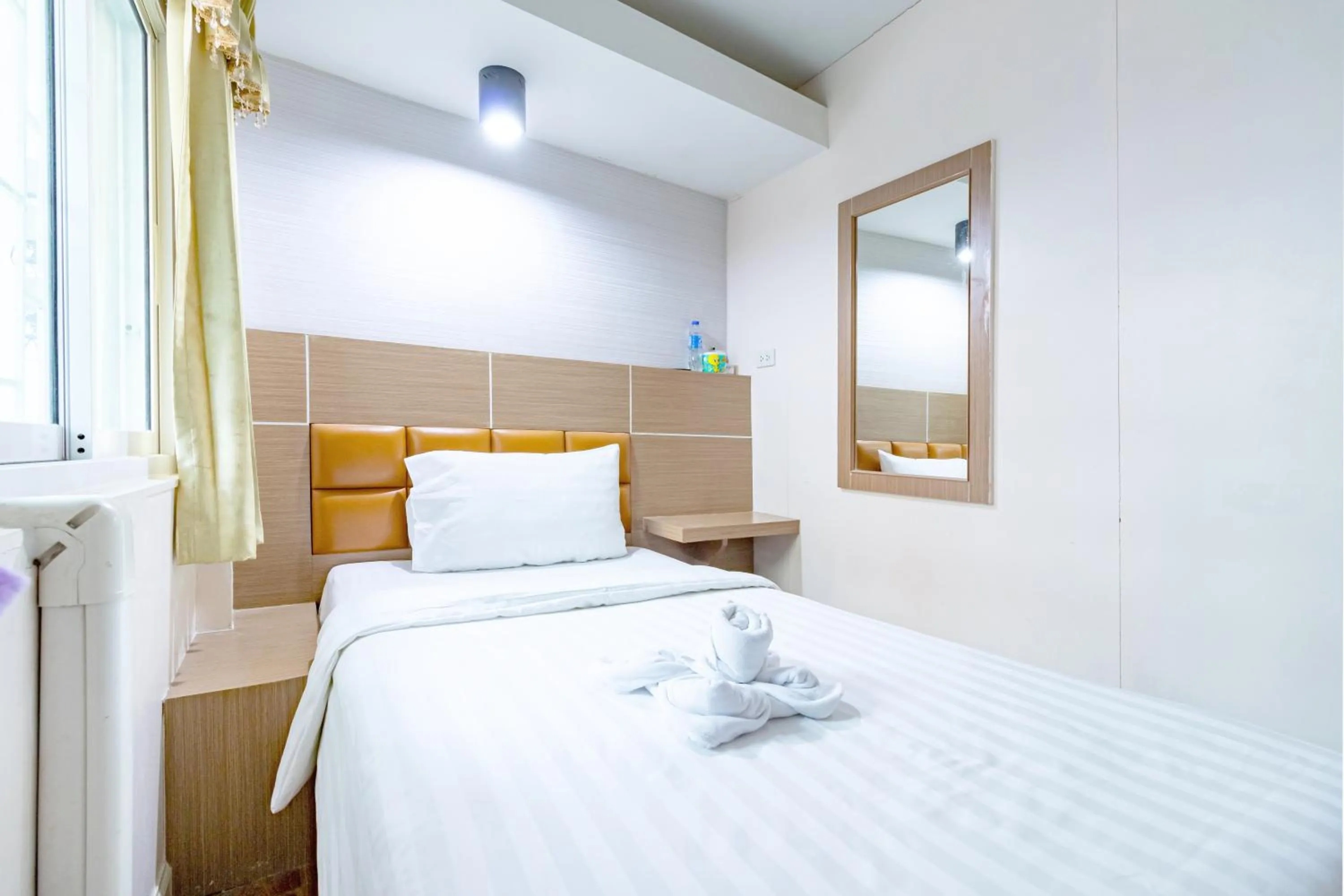 Bed in Oun Residence