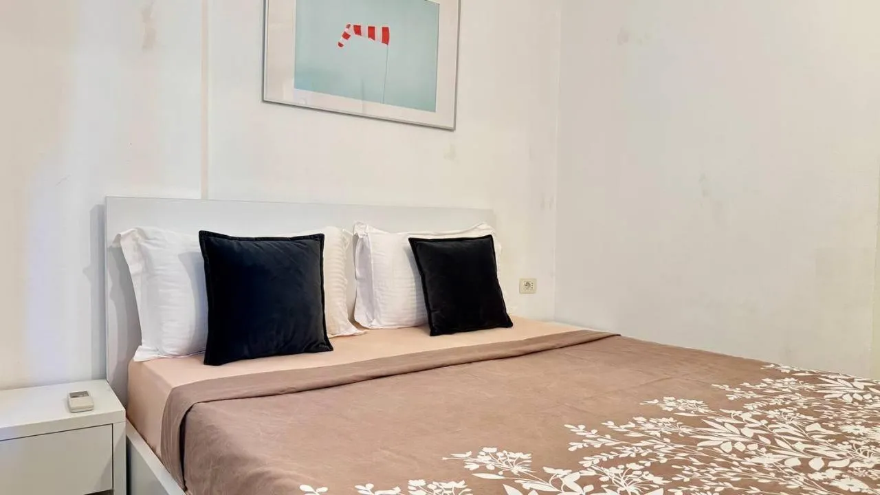 Bed in Sail View Boutique Apartment