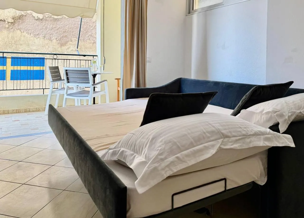 Bed in Sail View Boutique Apartment