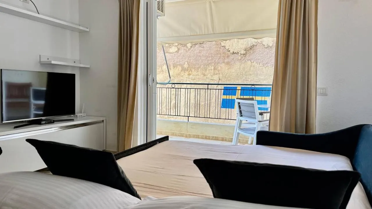 Bed in Sail View Boutique Apartment