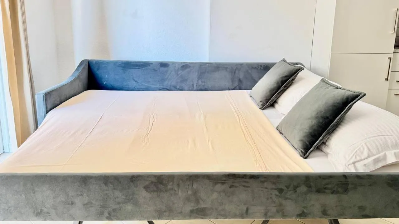 Bed in Sail View Boutique Apartment