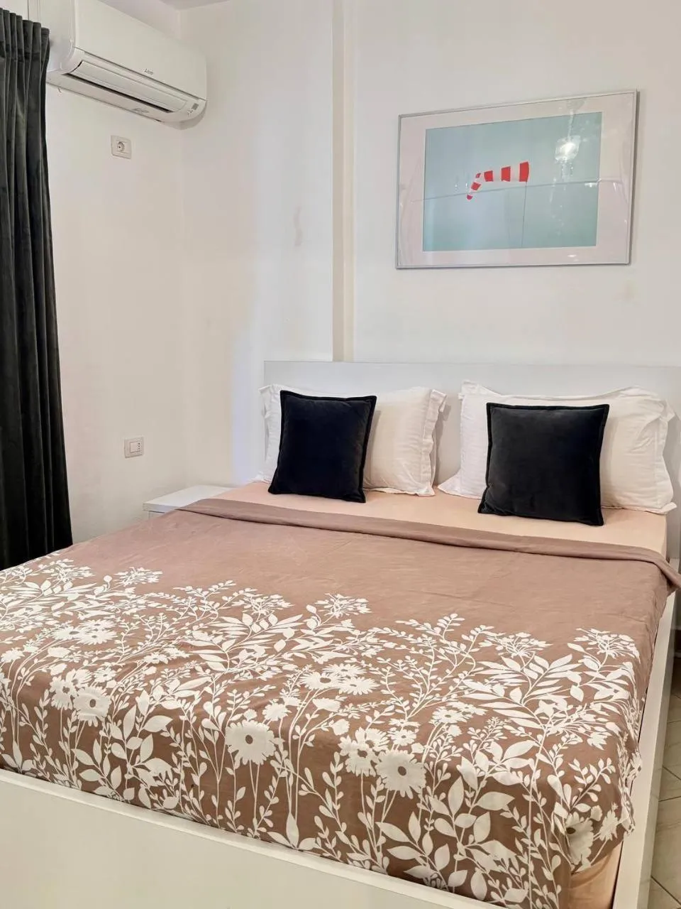 Bed in Sail View Boutique Apartment