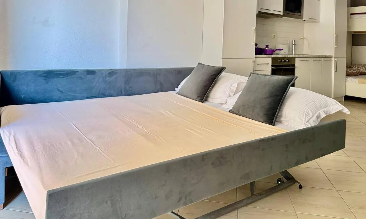 Bed in Sail View Boutique Apartment