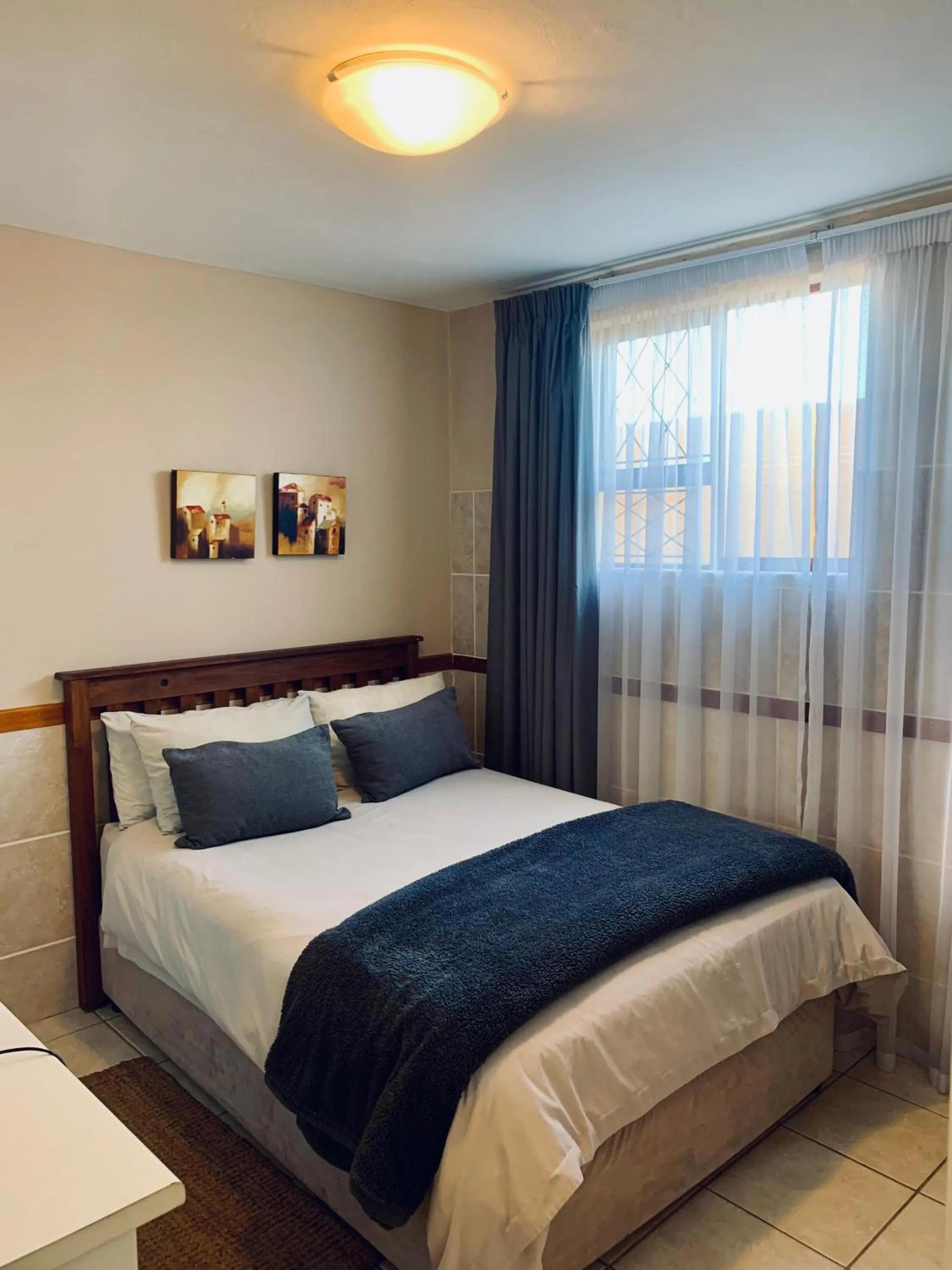 Bed in Summerstrand Beach Lodge