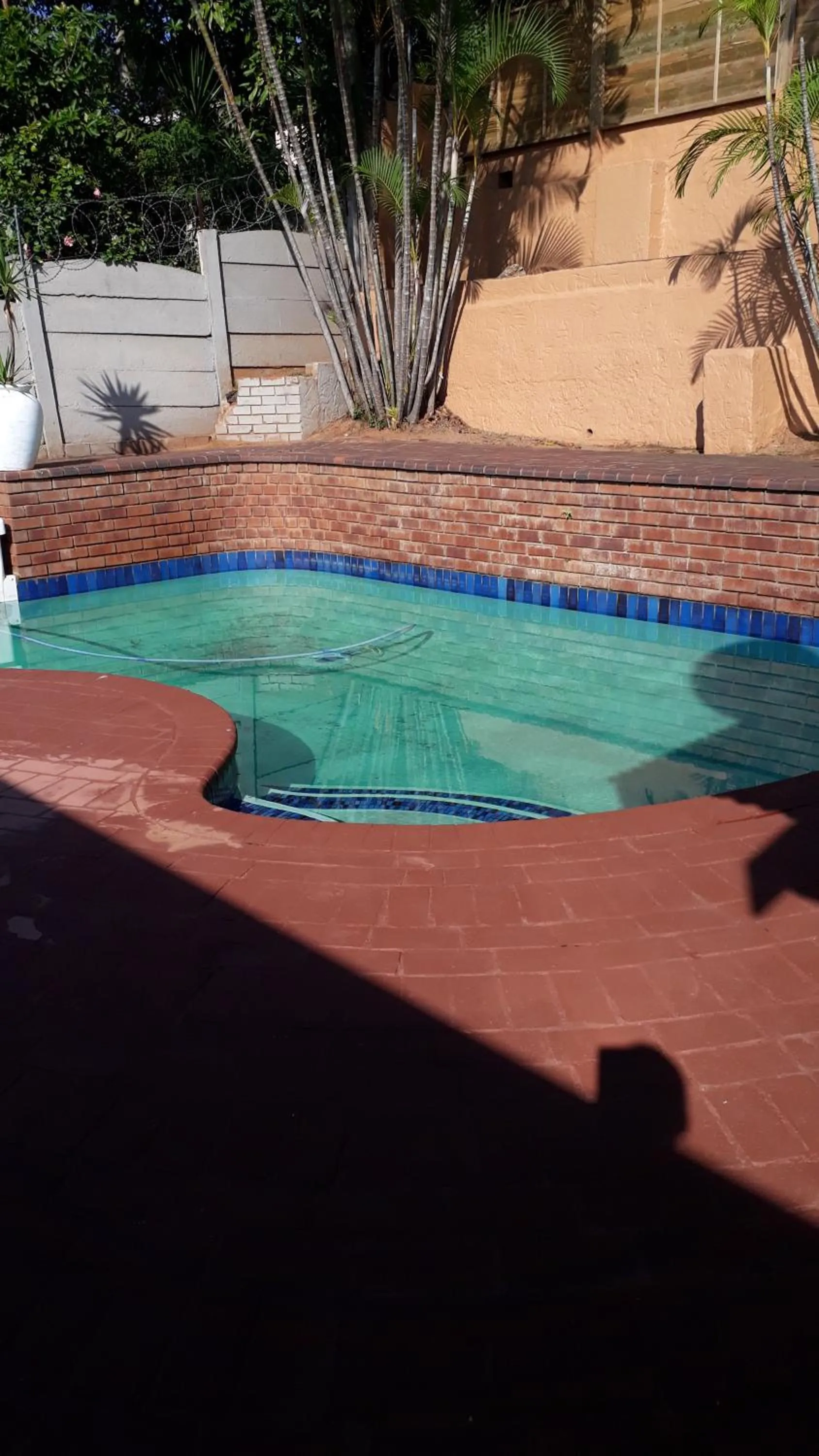 Swimming pool in DYNA GUEST HOUSE