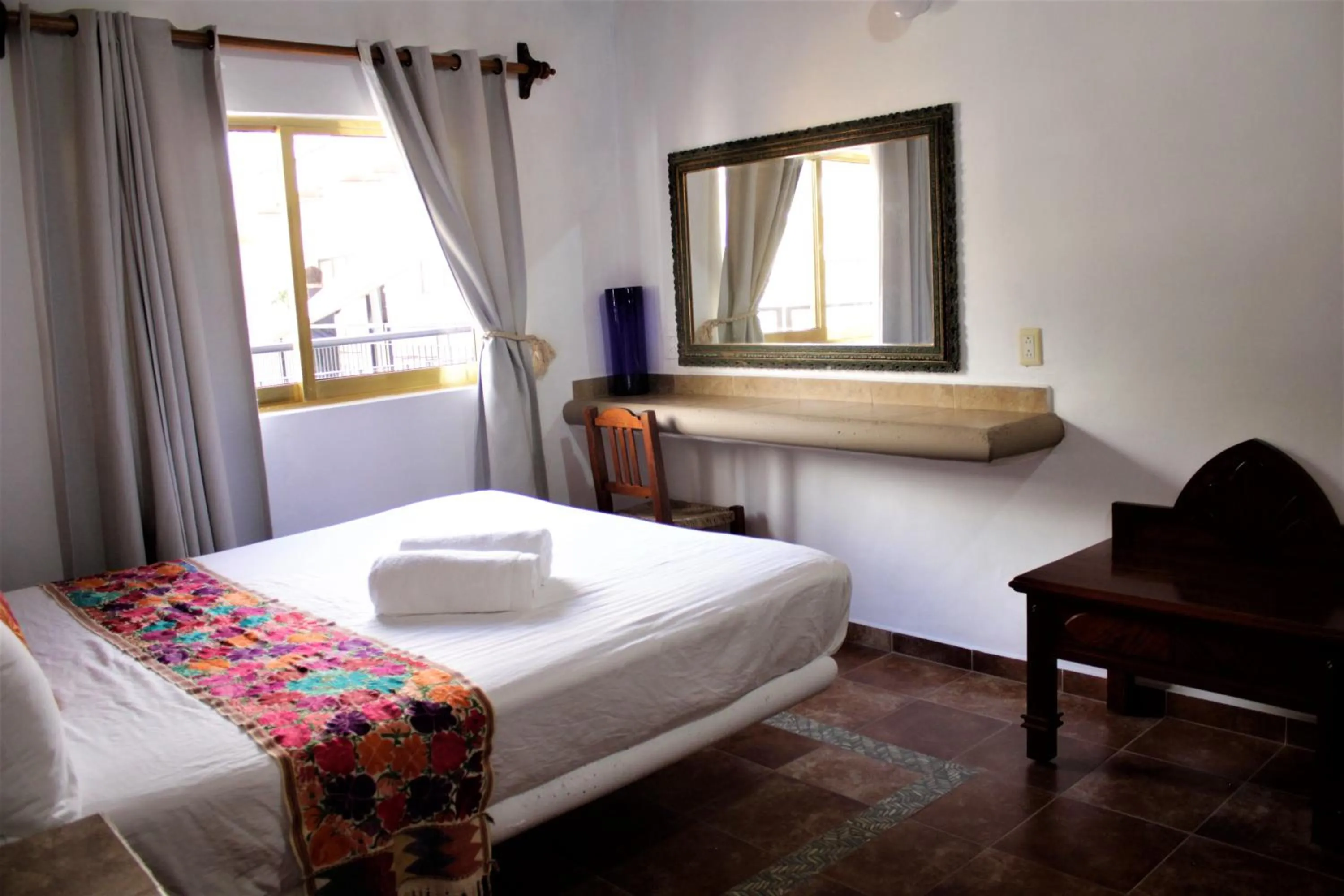 Photo of the whole room, Bed in Hotel Diamante Sayulita