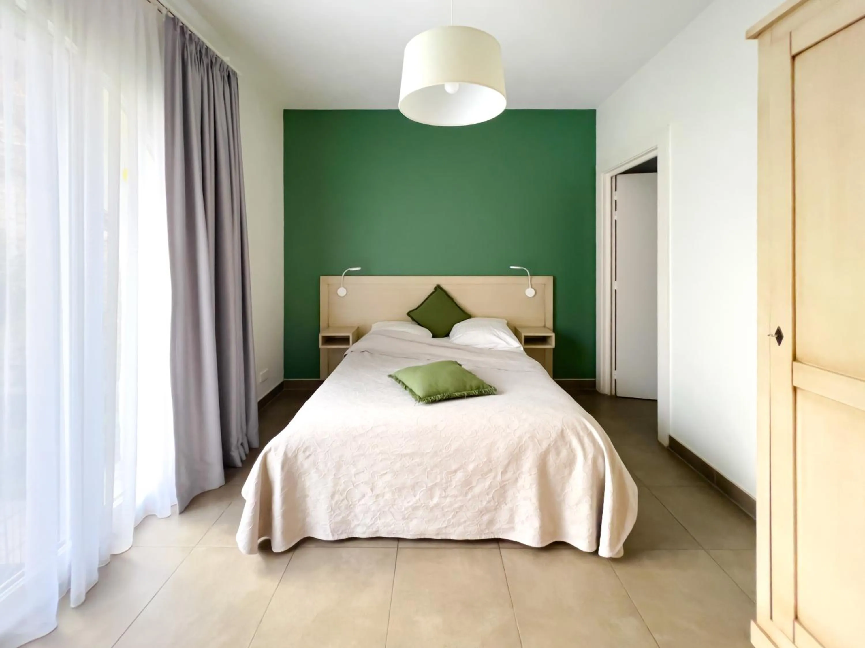 Bed in Gîtes et chambres d'hôtes Maison Ungerer