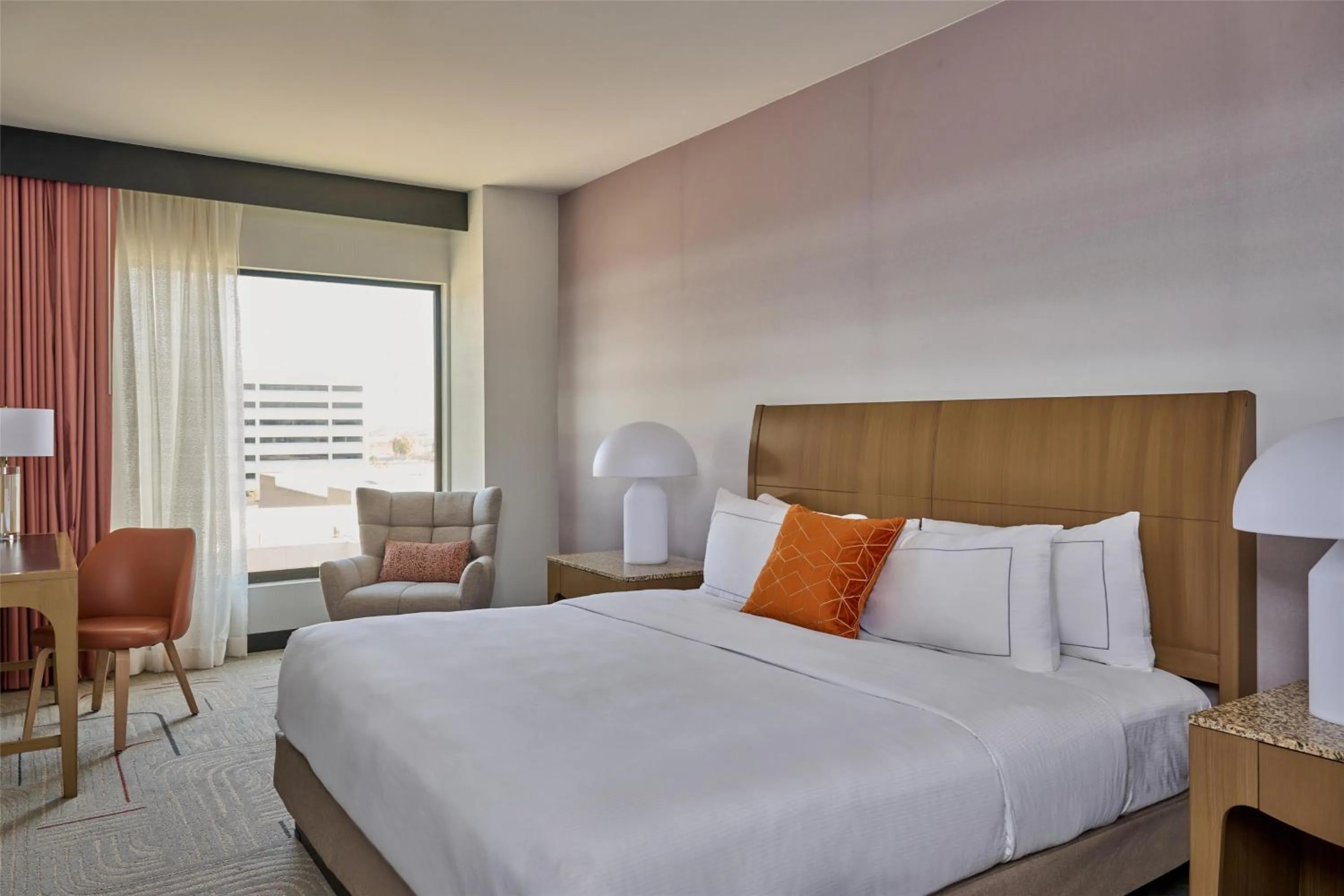 Bed in Hotel Zessa Orange County Airport, a DoubleTree by Hilton