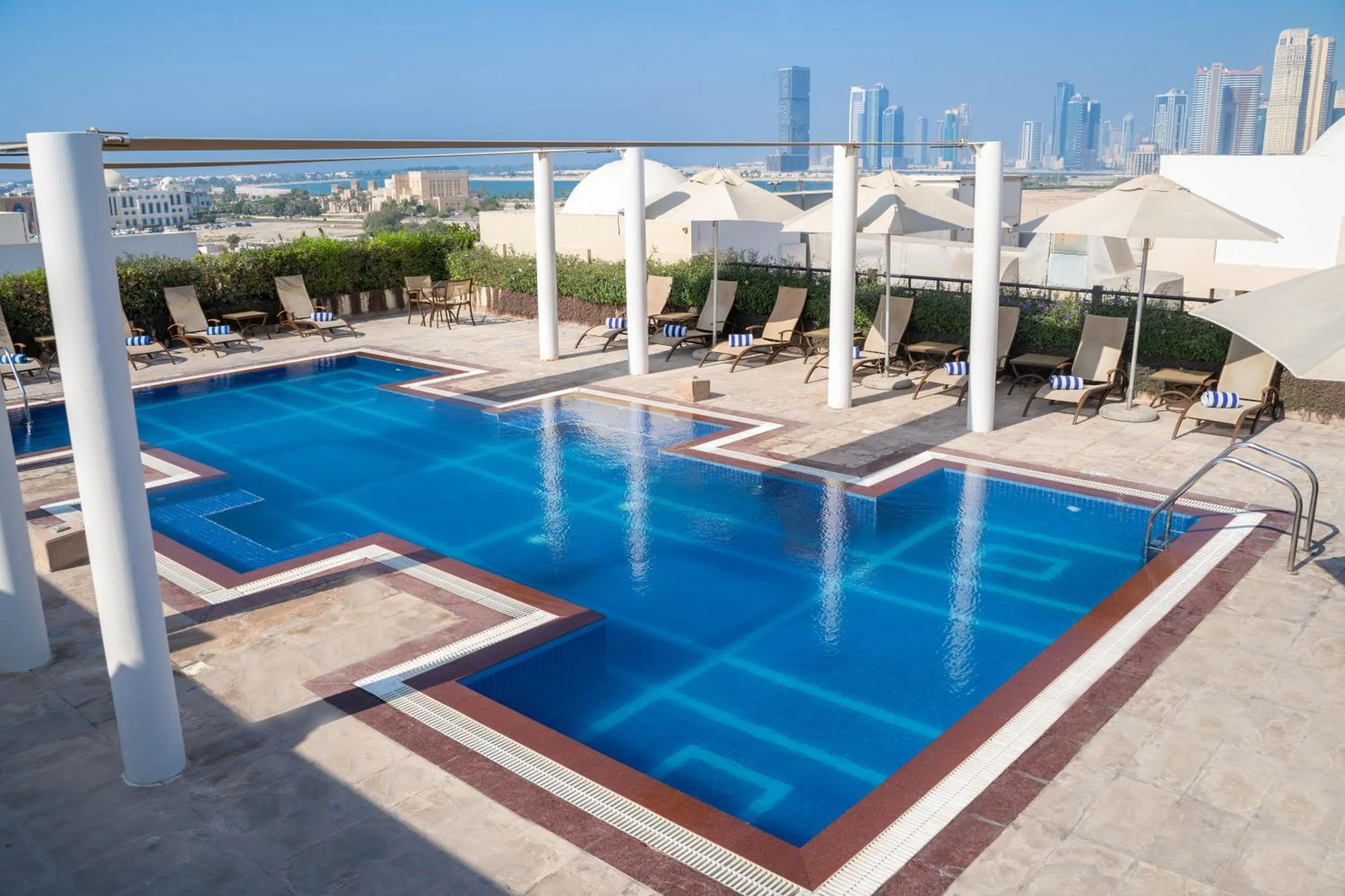Swimming pool in Mövenpick Hotel Apartments Al Mamzar Dubai
