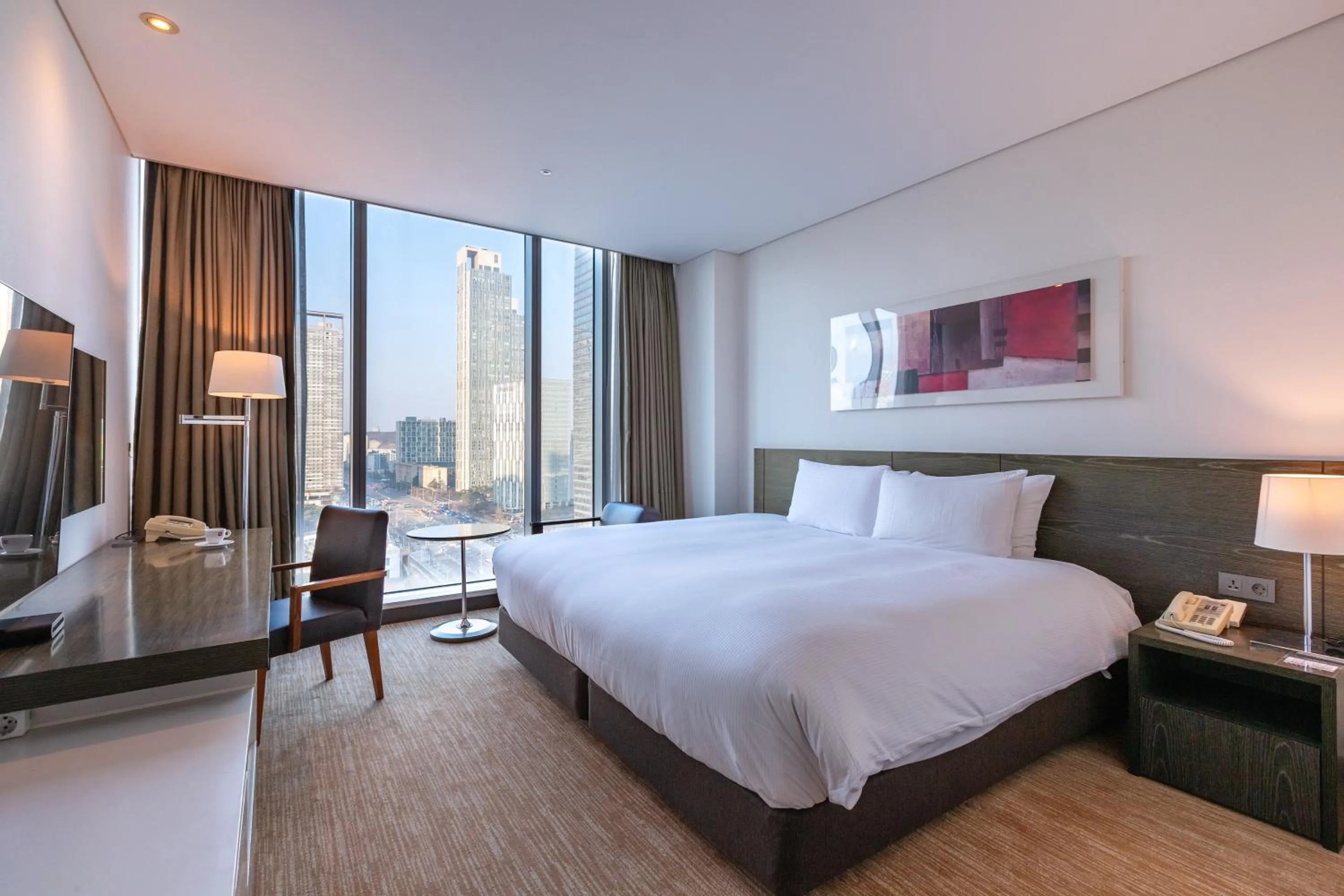 Bed in Orakai Songdo Park Hotel