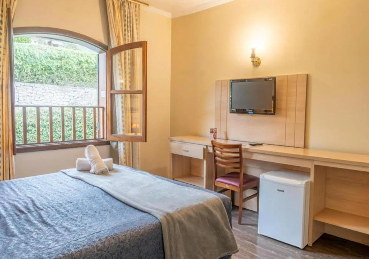 Bedroom, Bed in Hotel Euro Suíte Campos do Jordão By Nacional Inn - A 800 metros da Vila Capivari