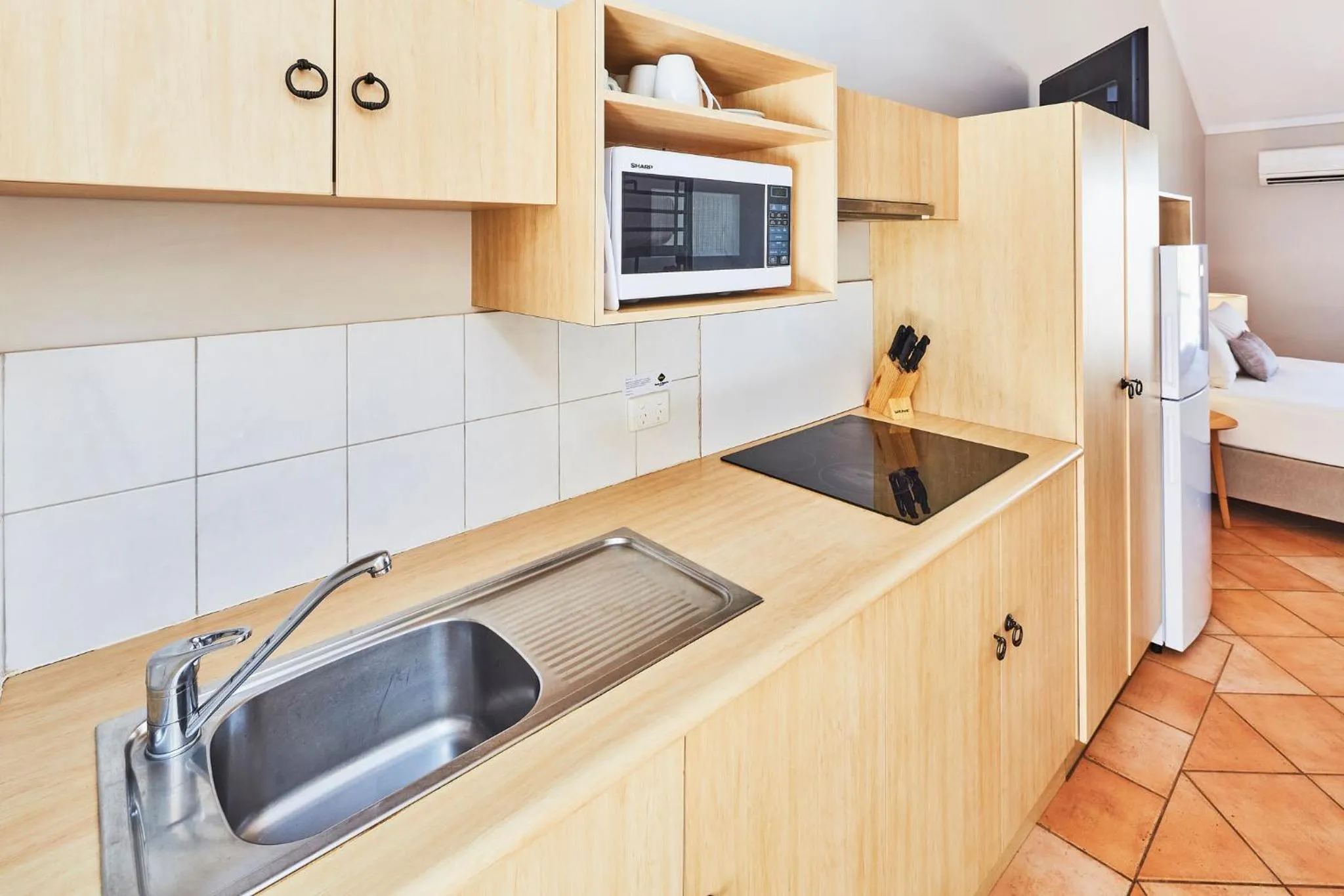 Kitchen or kitchenette in RAC Monkey Mia Dolphin Resort