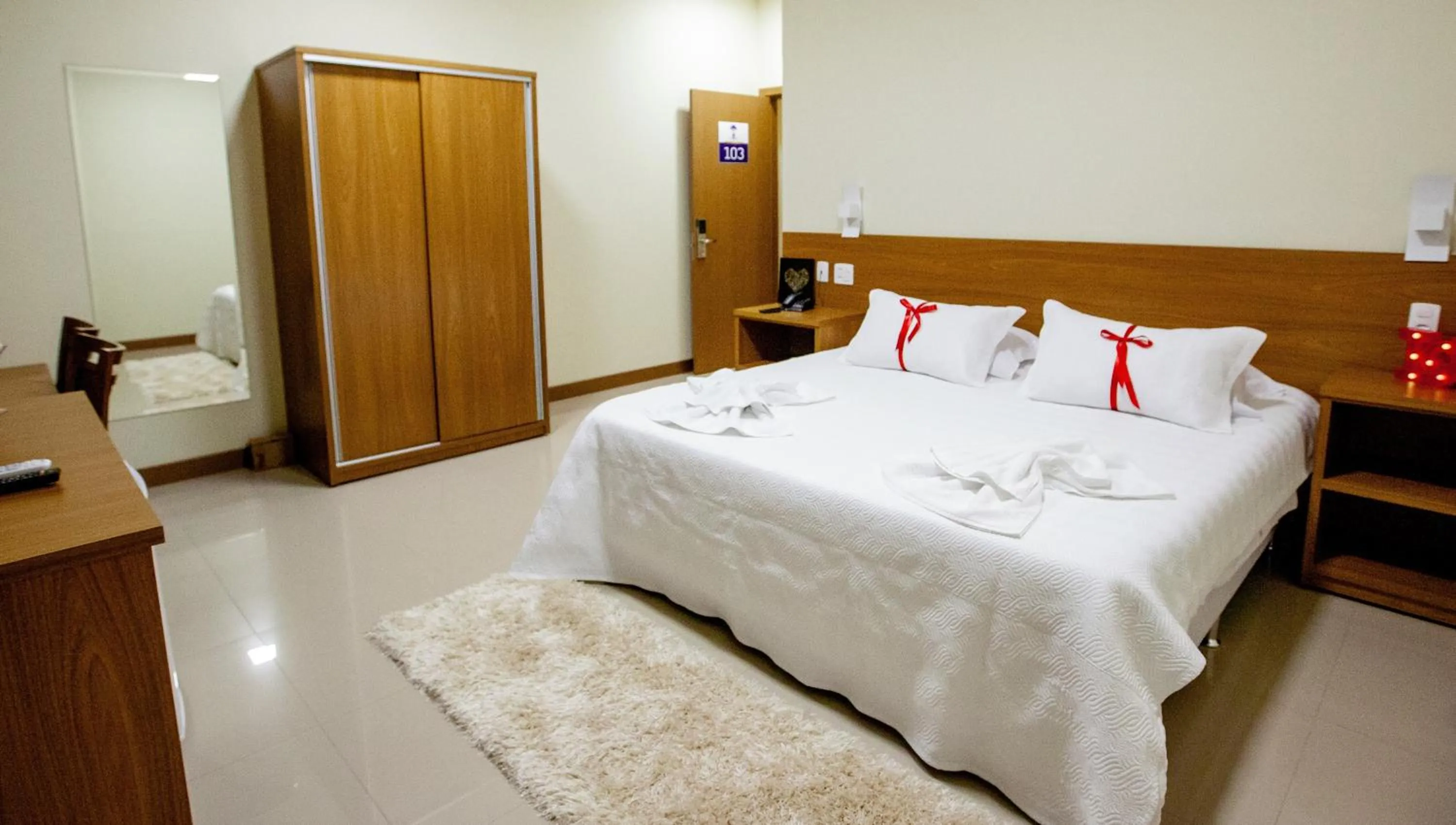 Bed in Ipê Palace Hotel