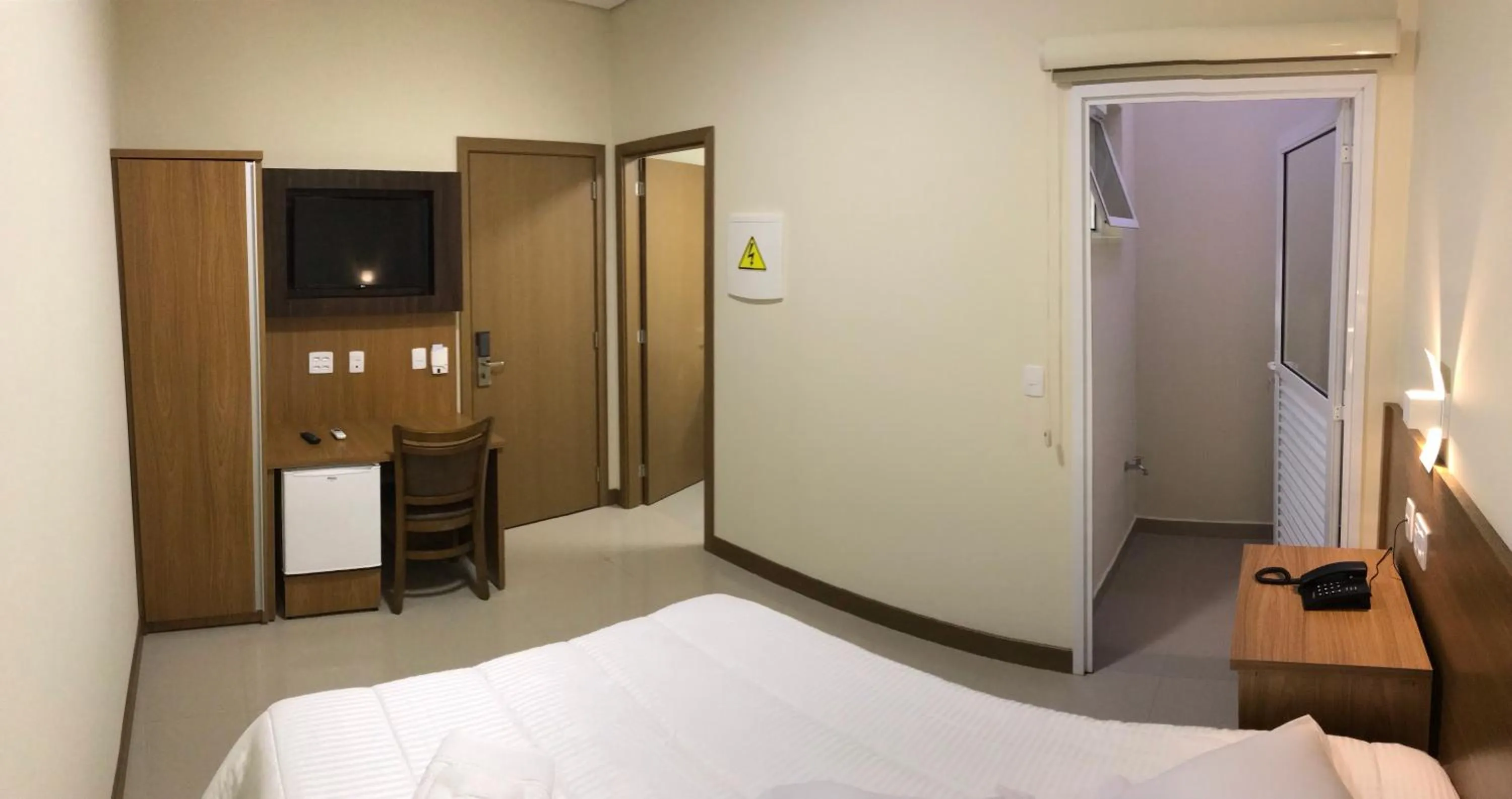 Bed in Ipê Palace Hotel