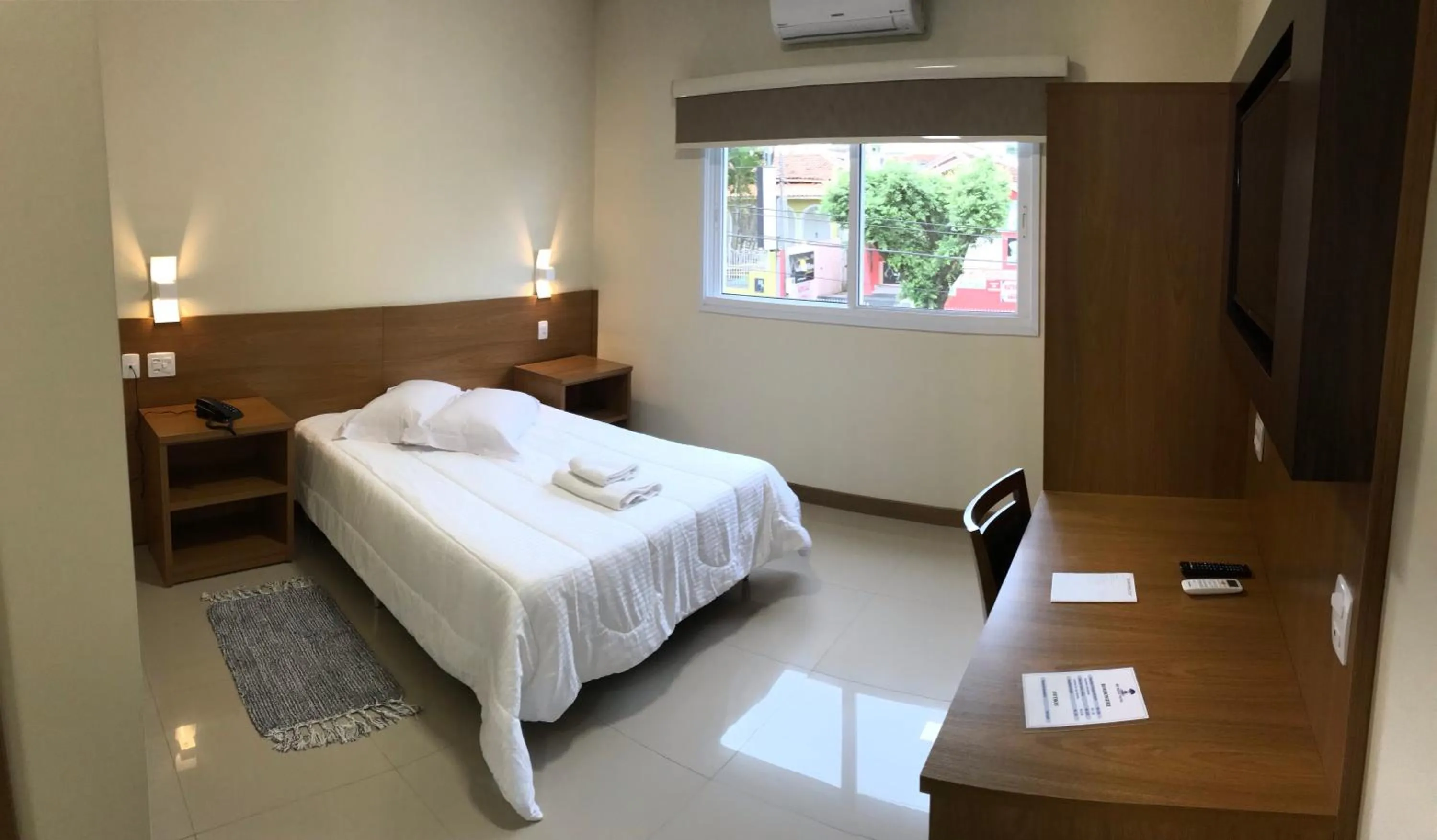 Bed in Ipê Palace Hotel